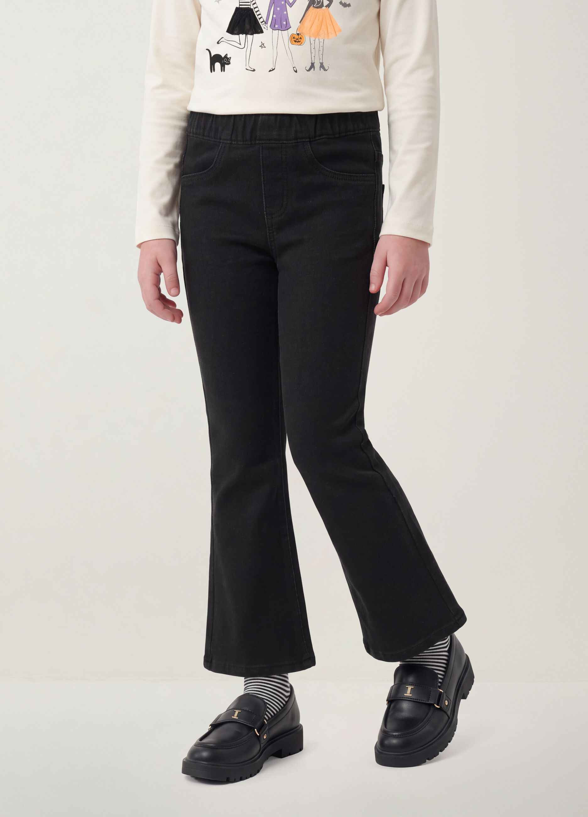 Jeggings nero flare in cotone elasticizzato per bambina