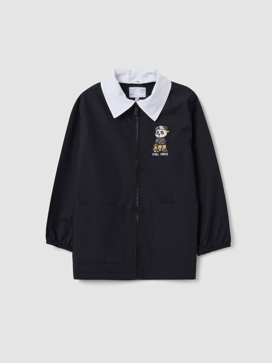 Customisable black school apron with embroidered panda for boys_0
