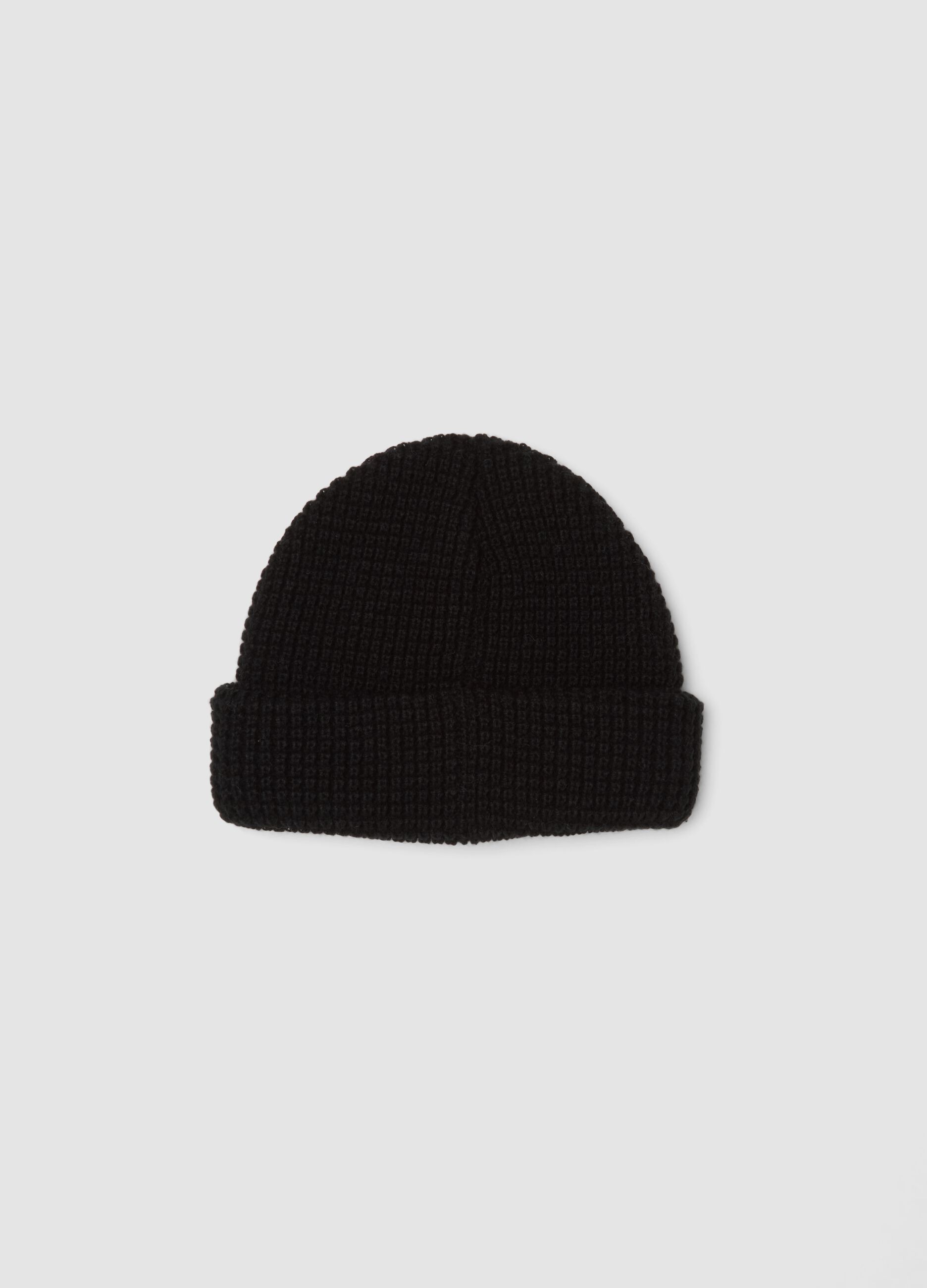 Black ribbed knit beanie with turn-up cuff