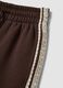 Brown cotton-blend wide-leg trousers with lace detailing_1