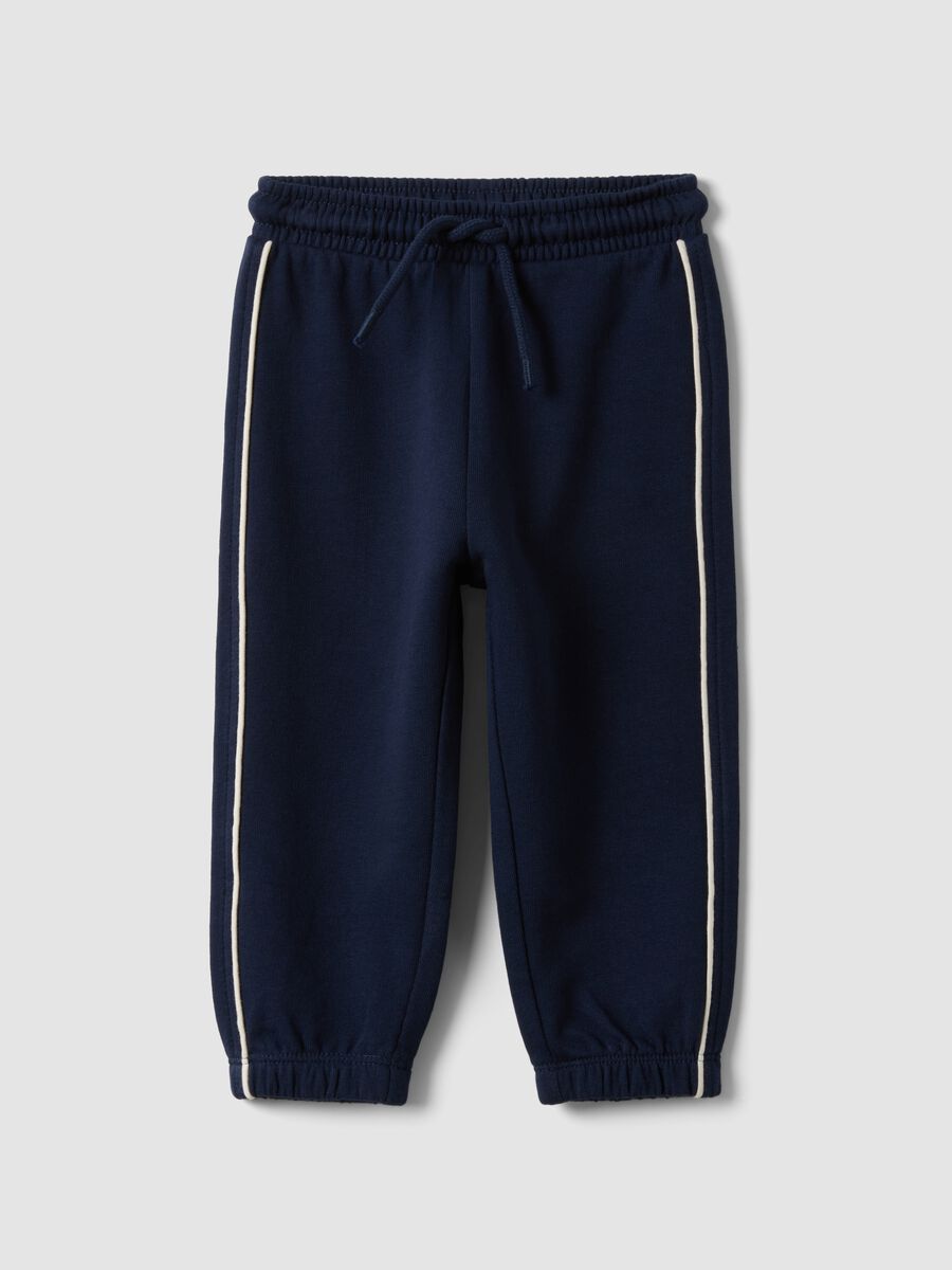 Blue organic cotton jogger trousers with drawstring for baby boy_0