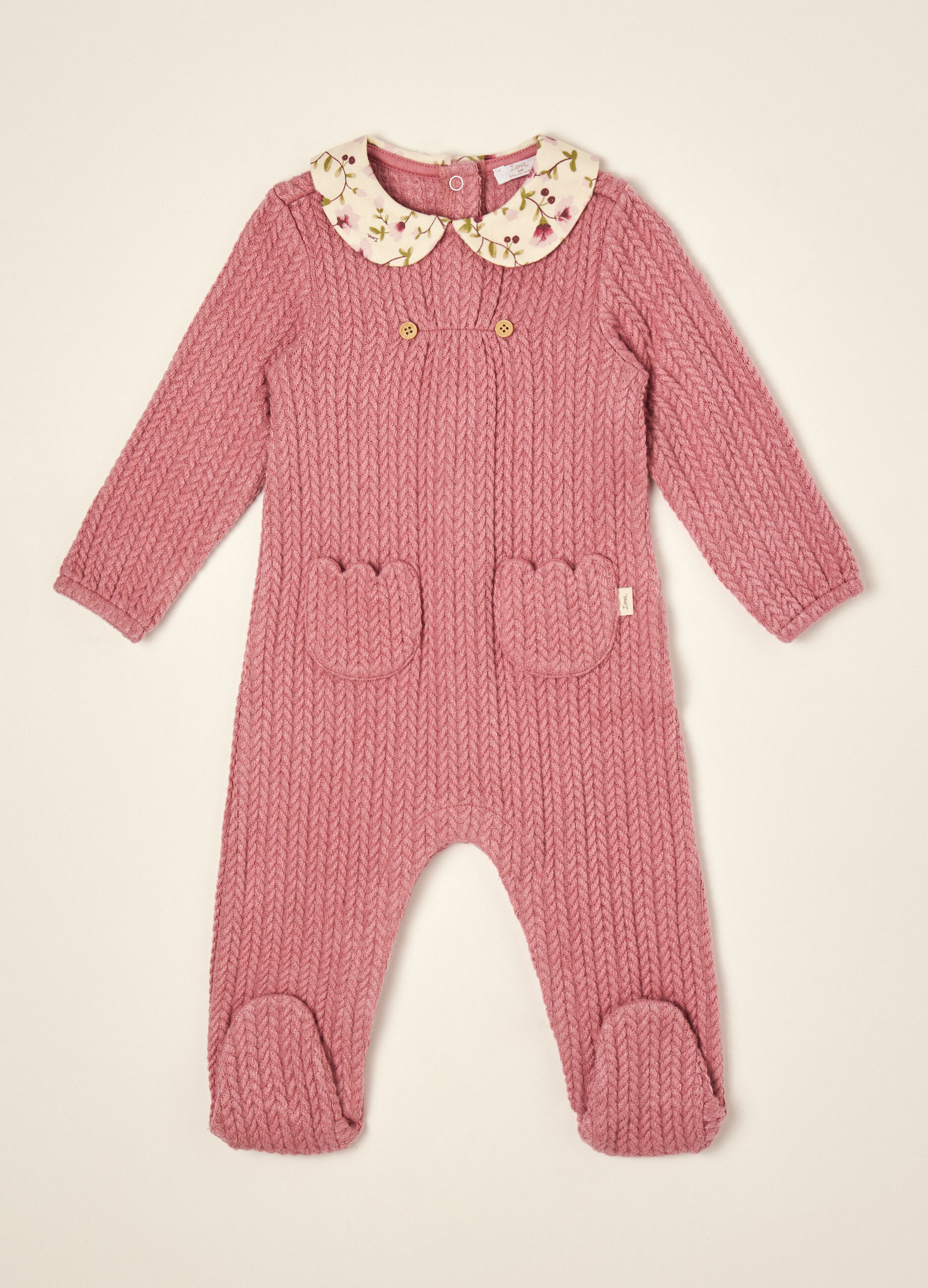 Pink stretch viscose baby sleepsuit with floral collar