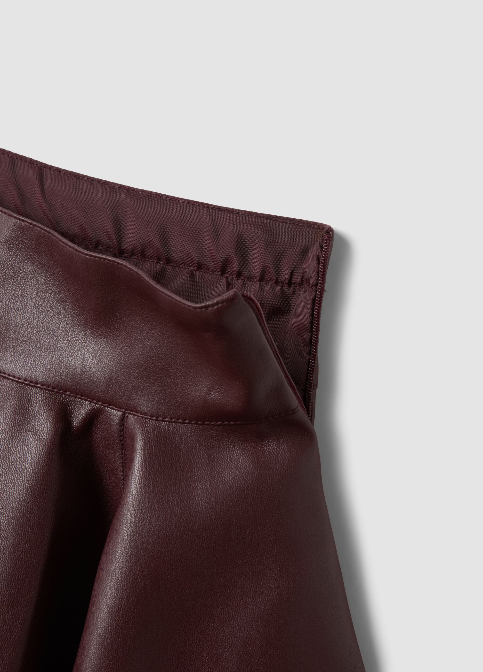 Brown circle skirt with coated-effect finish
