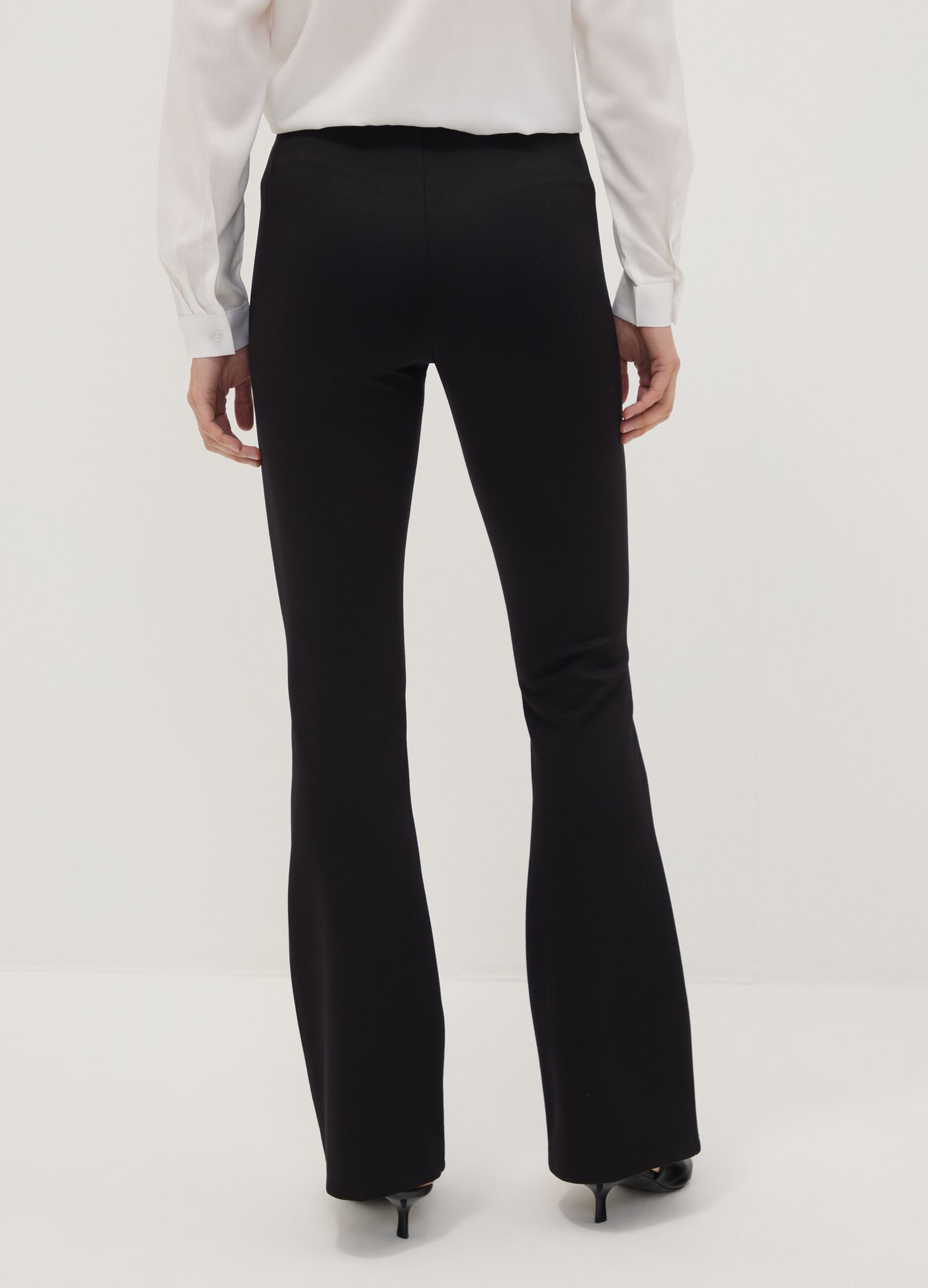 Black flared leggings in stretch viscose Milano stitch