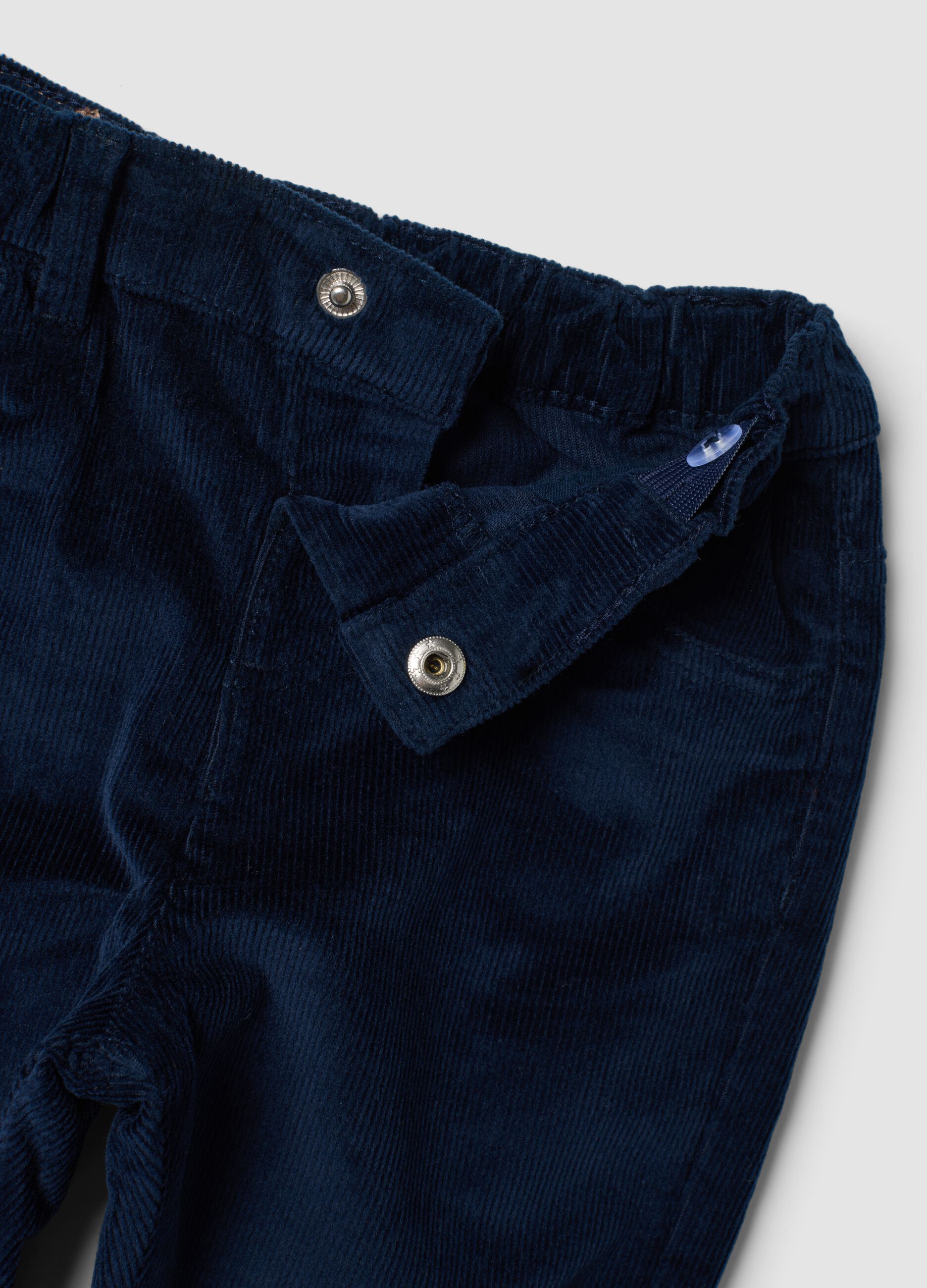 Pantaloni blu scuro in cotone elasticizzato a coste