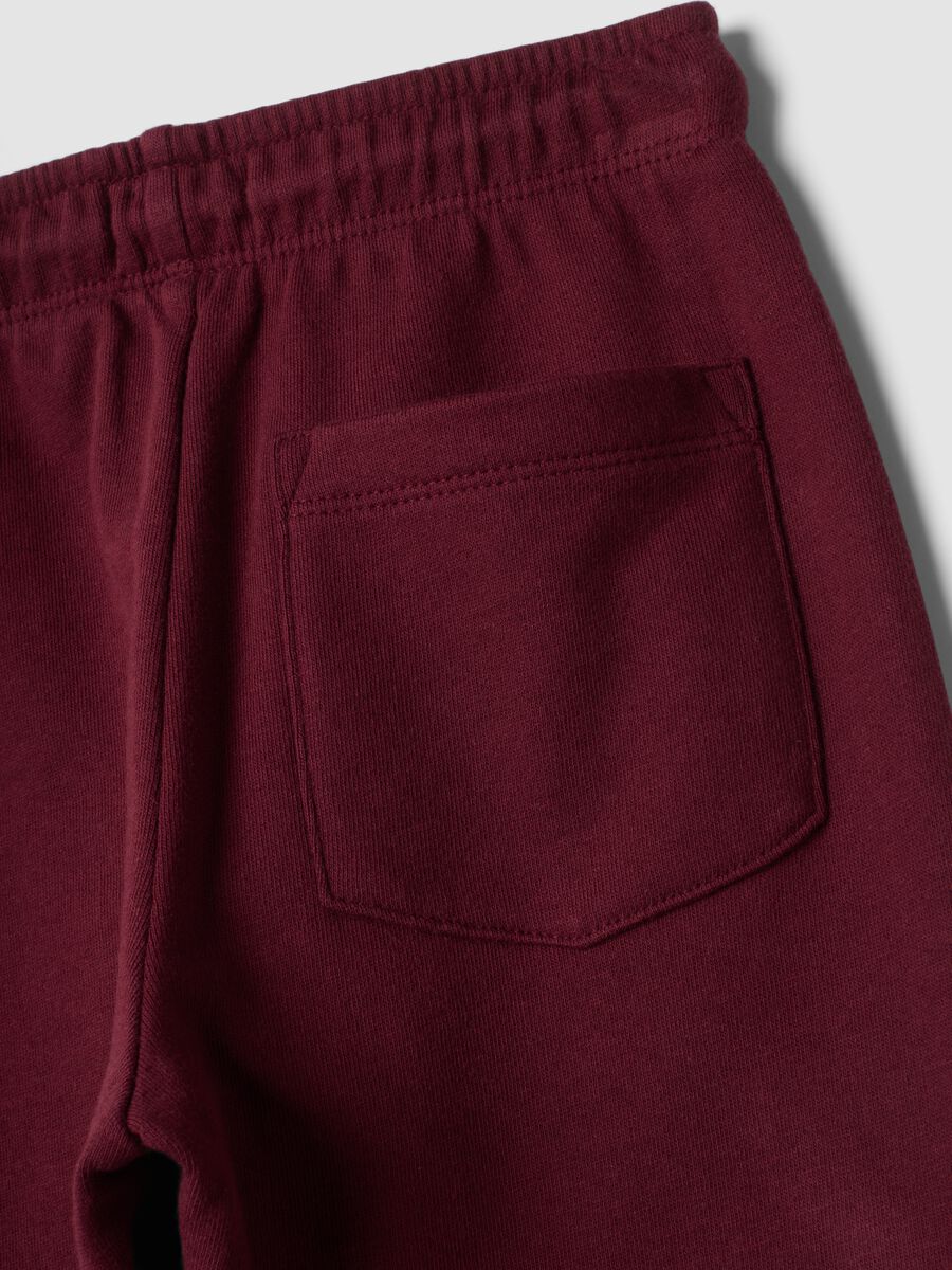 Pantaloni jogger rossi in puro cotone con stampa_3