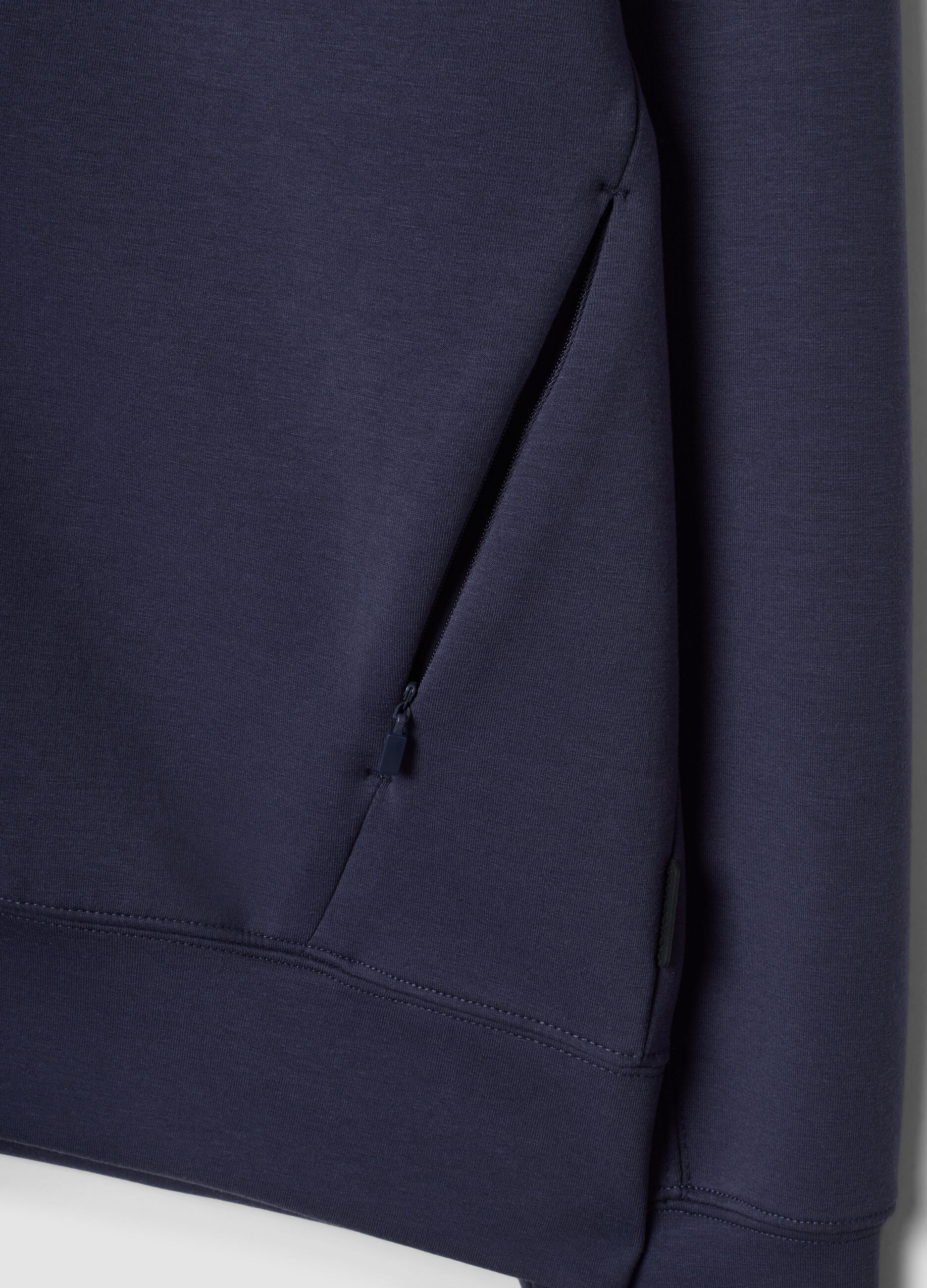 Breathable blue full-zip in 2-way stretch fabric