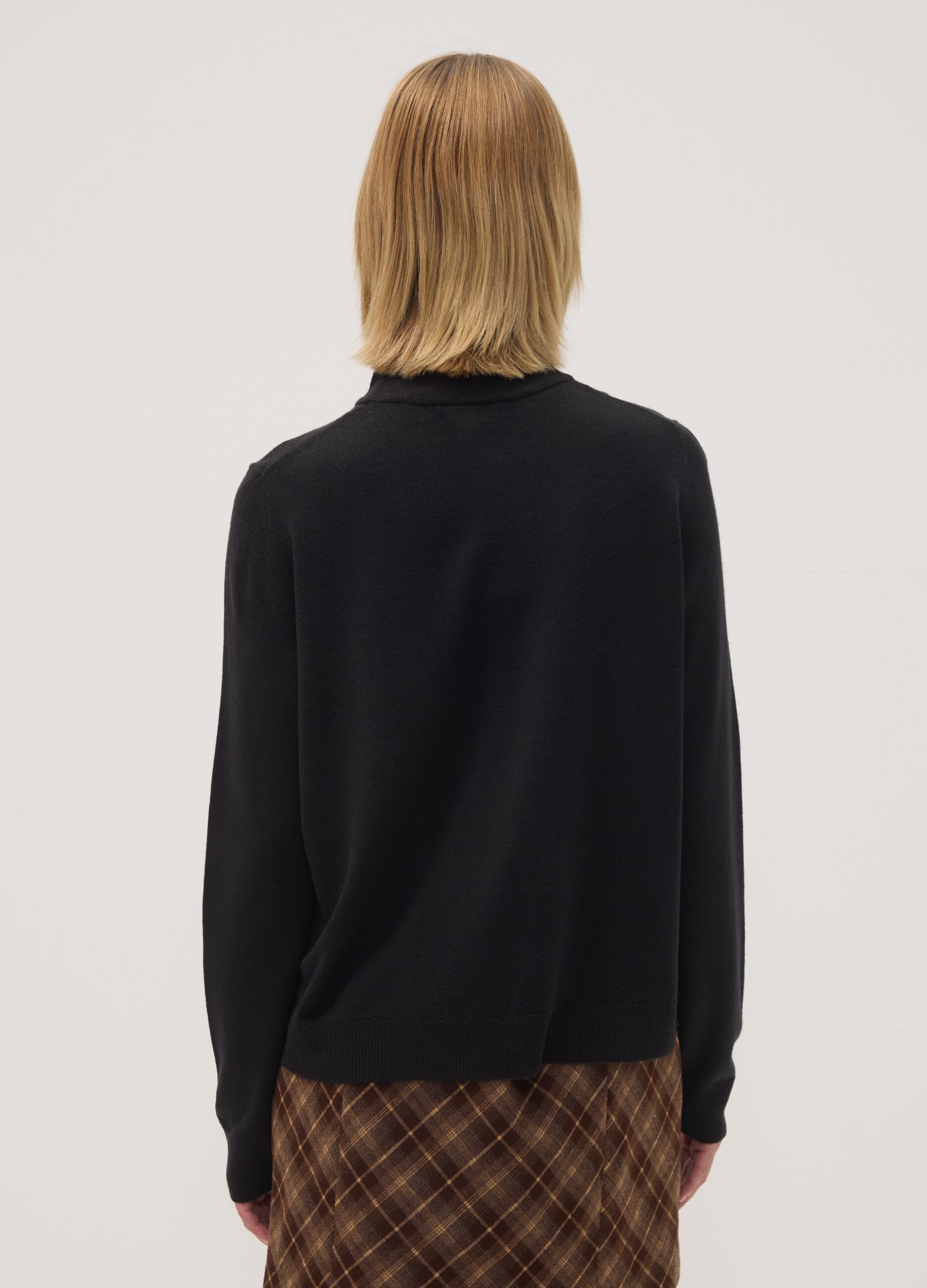 Black long-sleeve top with raised neckline, regular fit