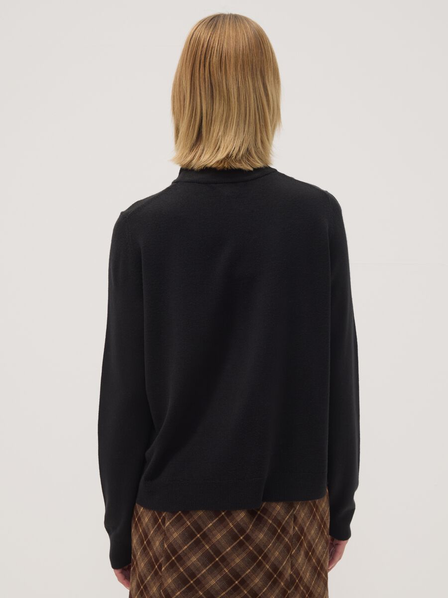 Black long-sleeve top with raised neckline, regular fit_3