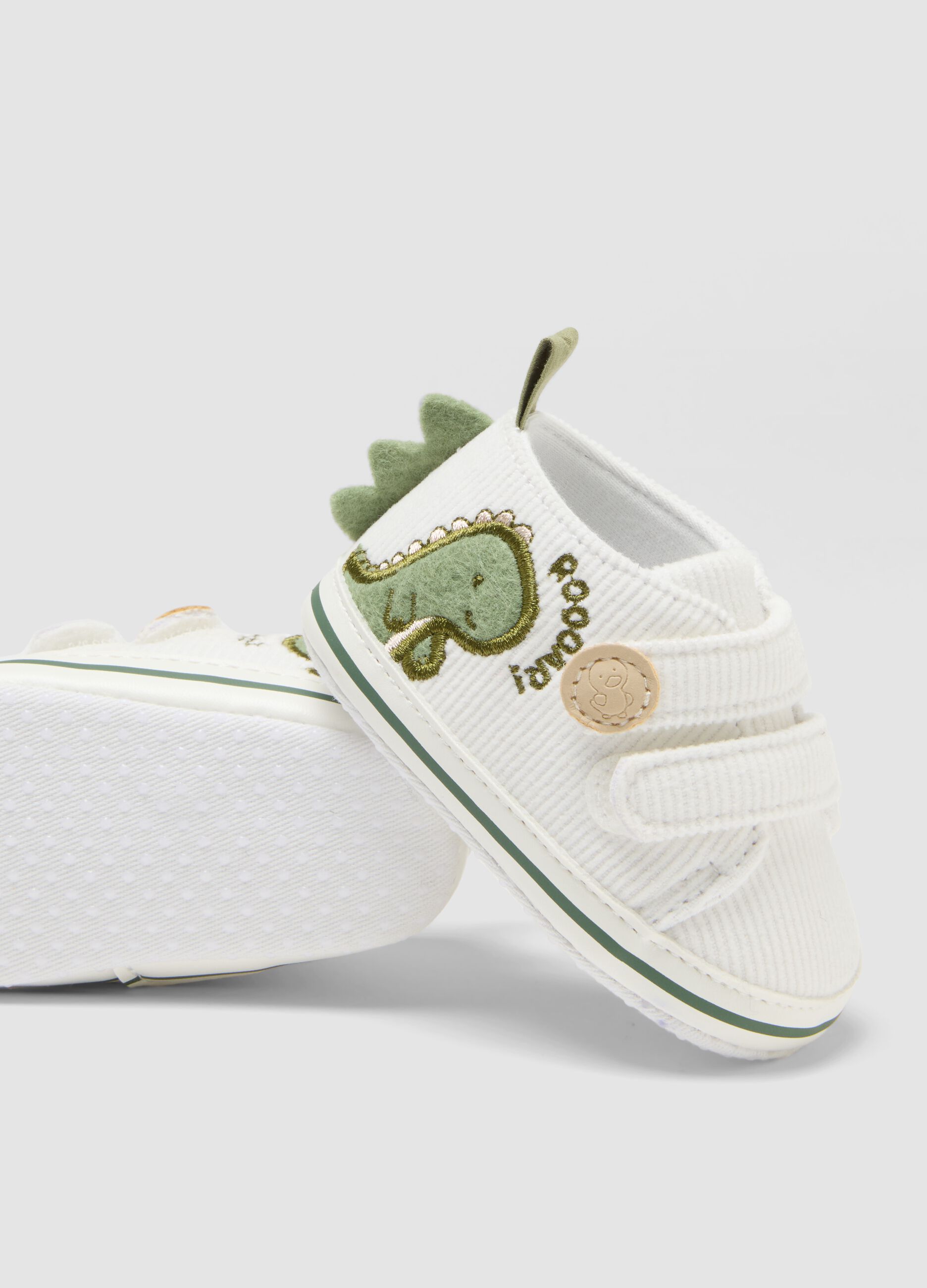 Scarpine bianche con dinosauro e chiusura a strappo