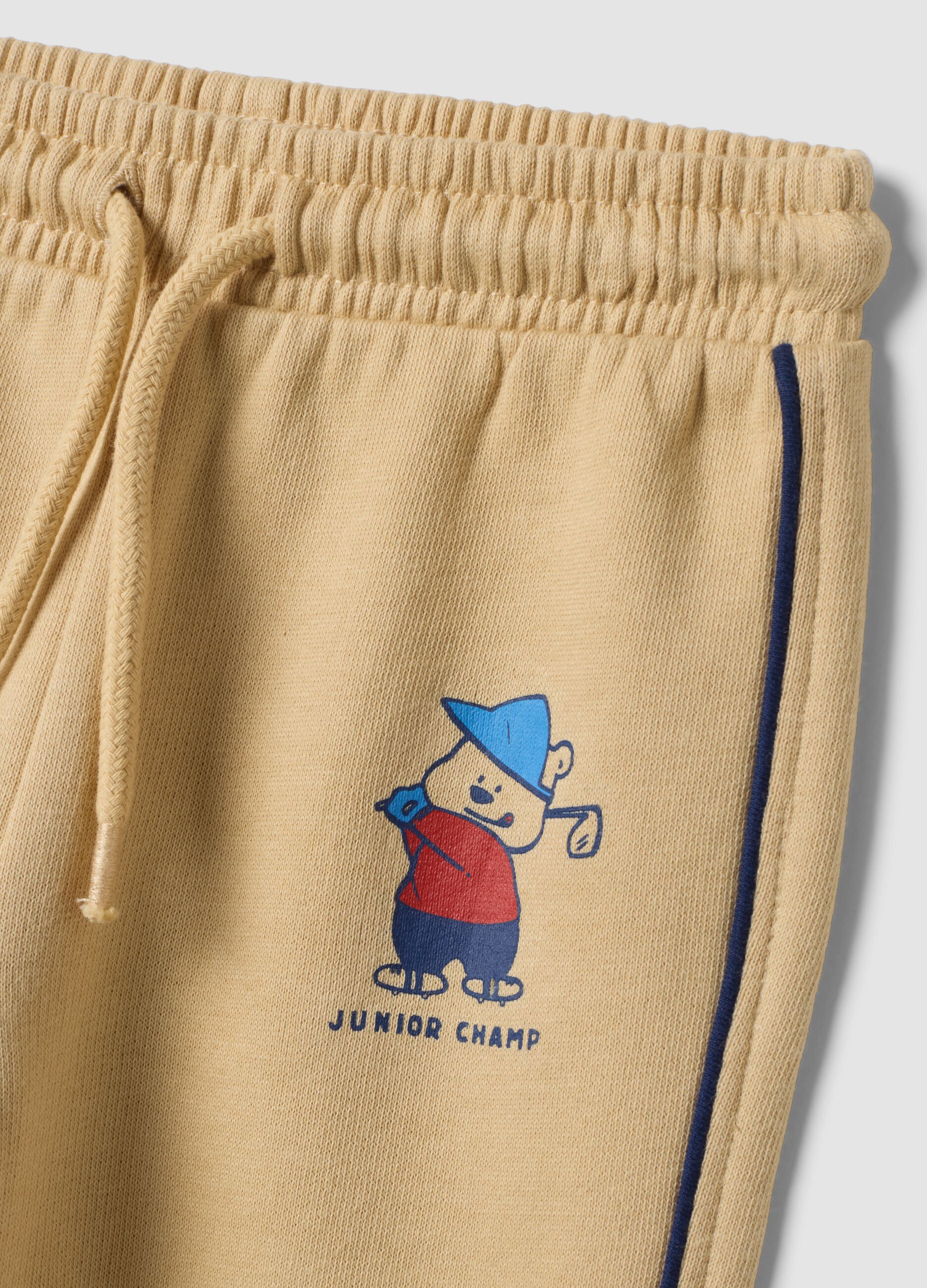 Beige pure cotton joggers with print