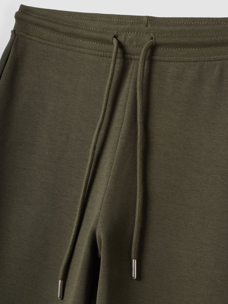 Green flared joggers in stretch organic cotton_1