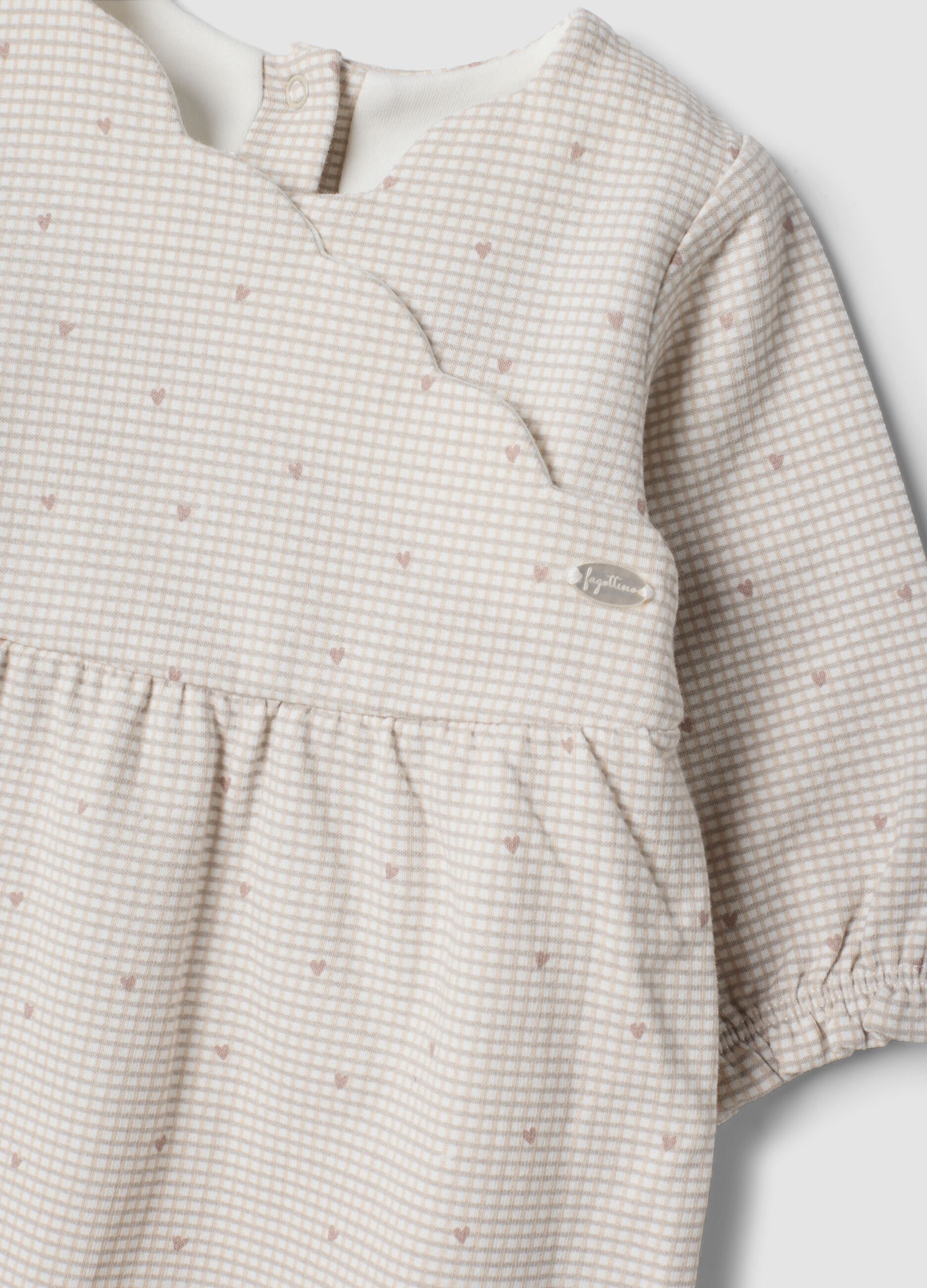 White pure organic cotton baby sleepsuit with gingham print