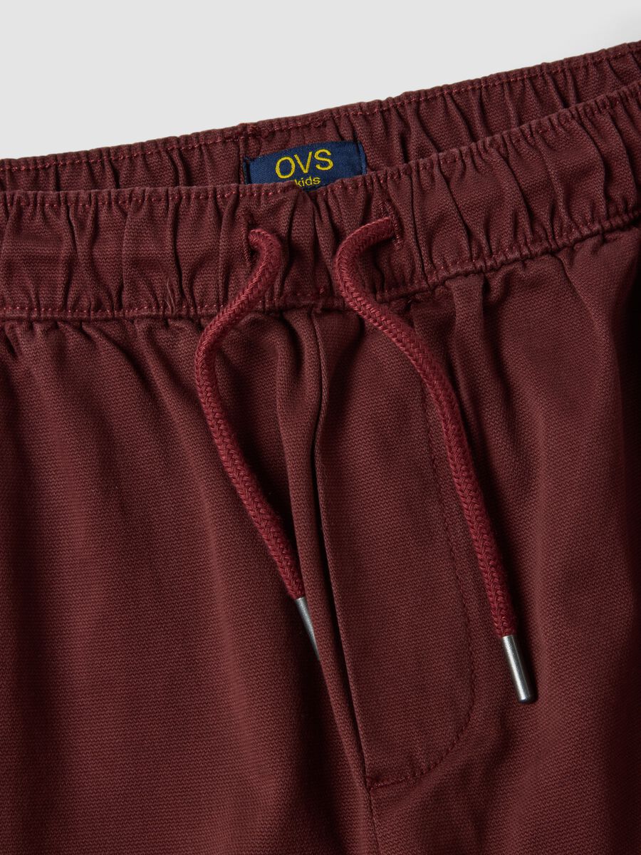 Red stretch cotton joggers with elasticated cuffs, comfort fit_1