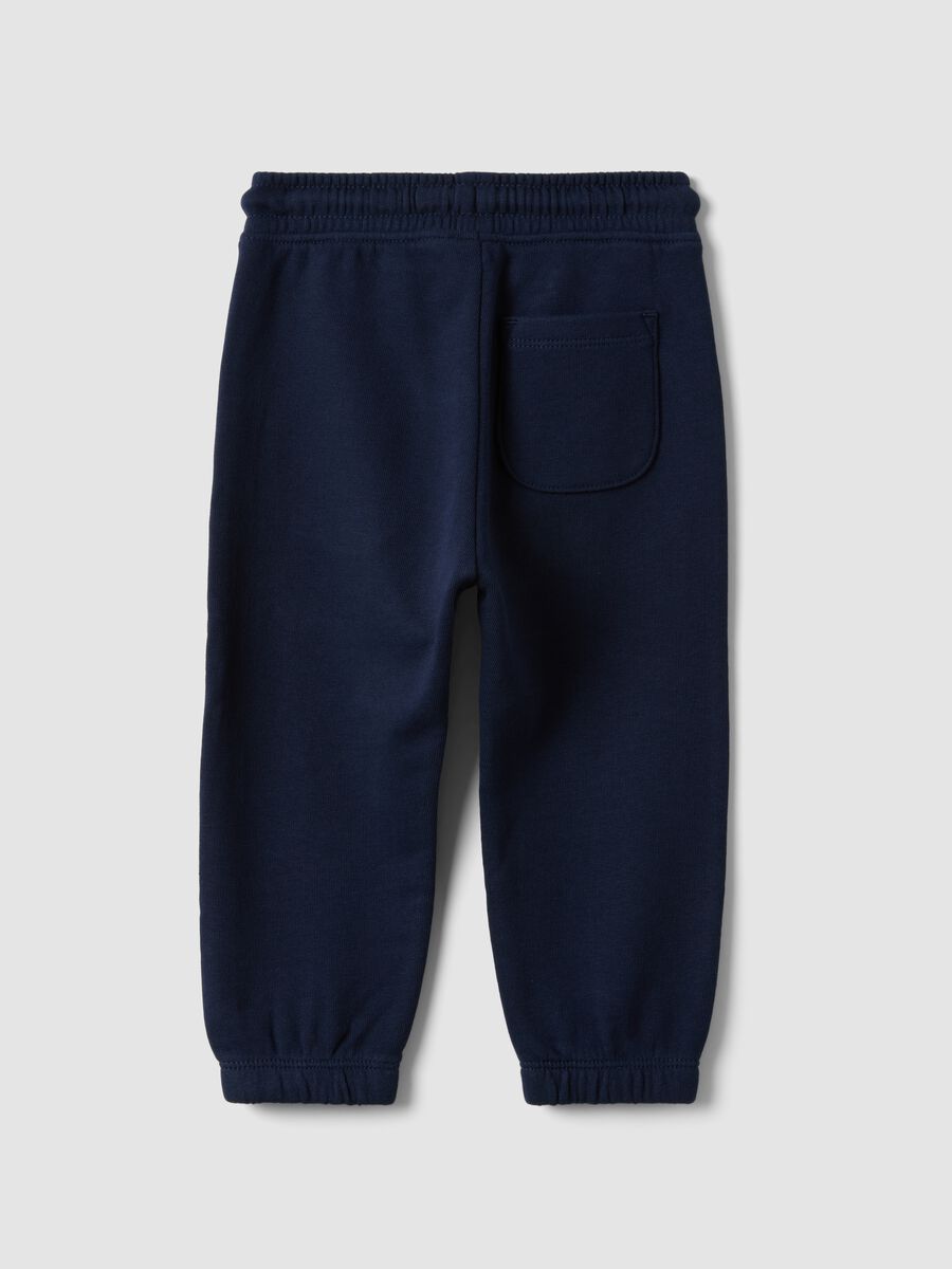 Blue jogger trousers in pure organic cotton with drawstring for baby boy_1