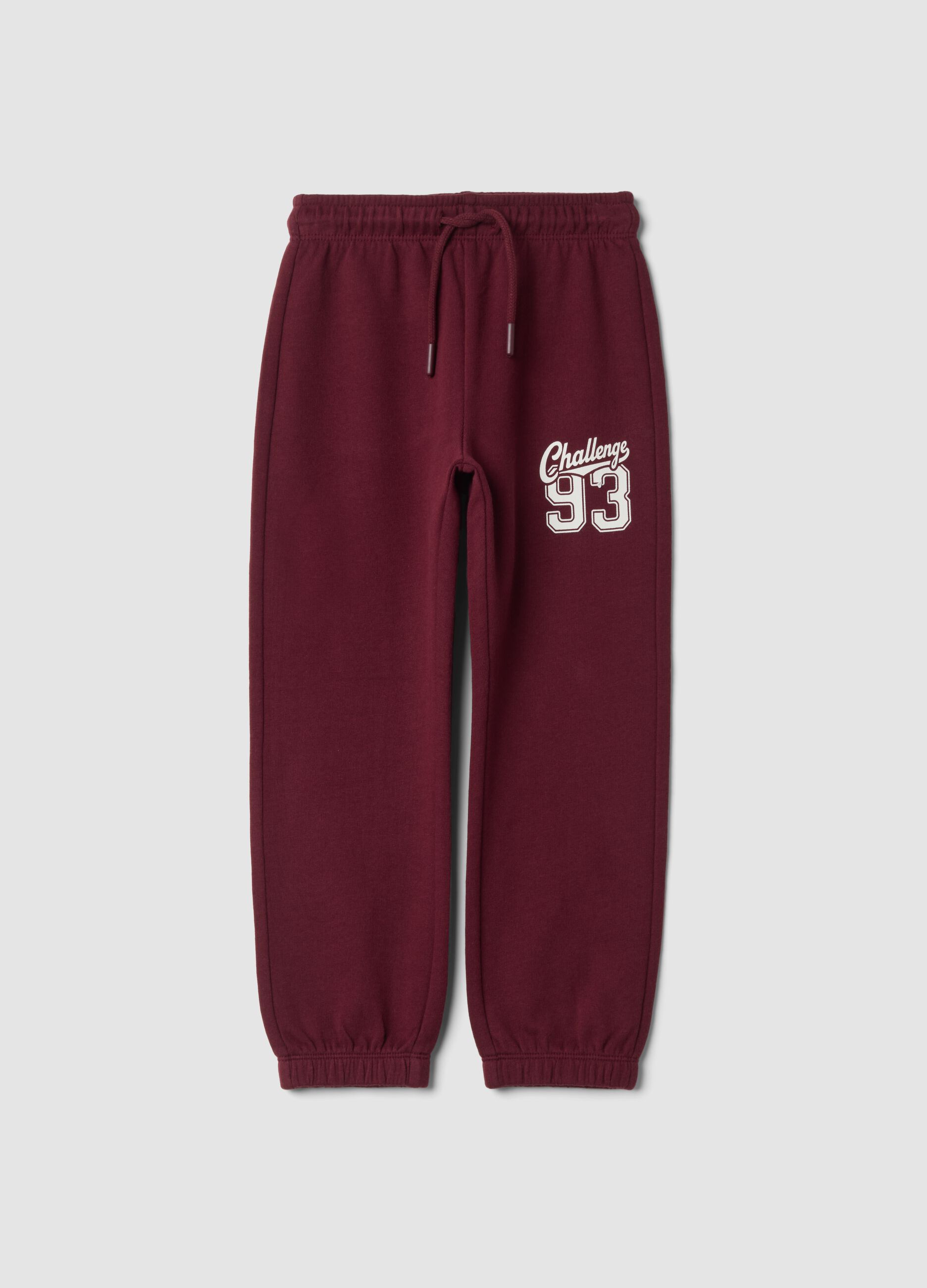 Pantaloni jogger rossi in puro cotone con stampa