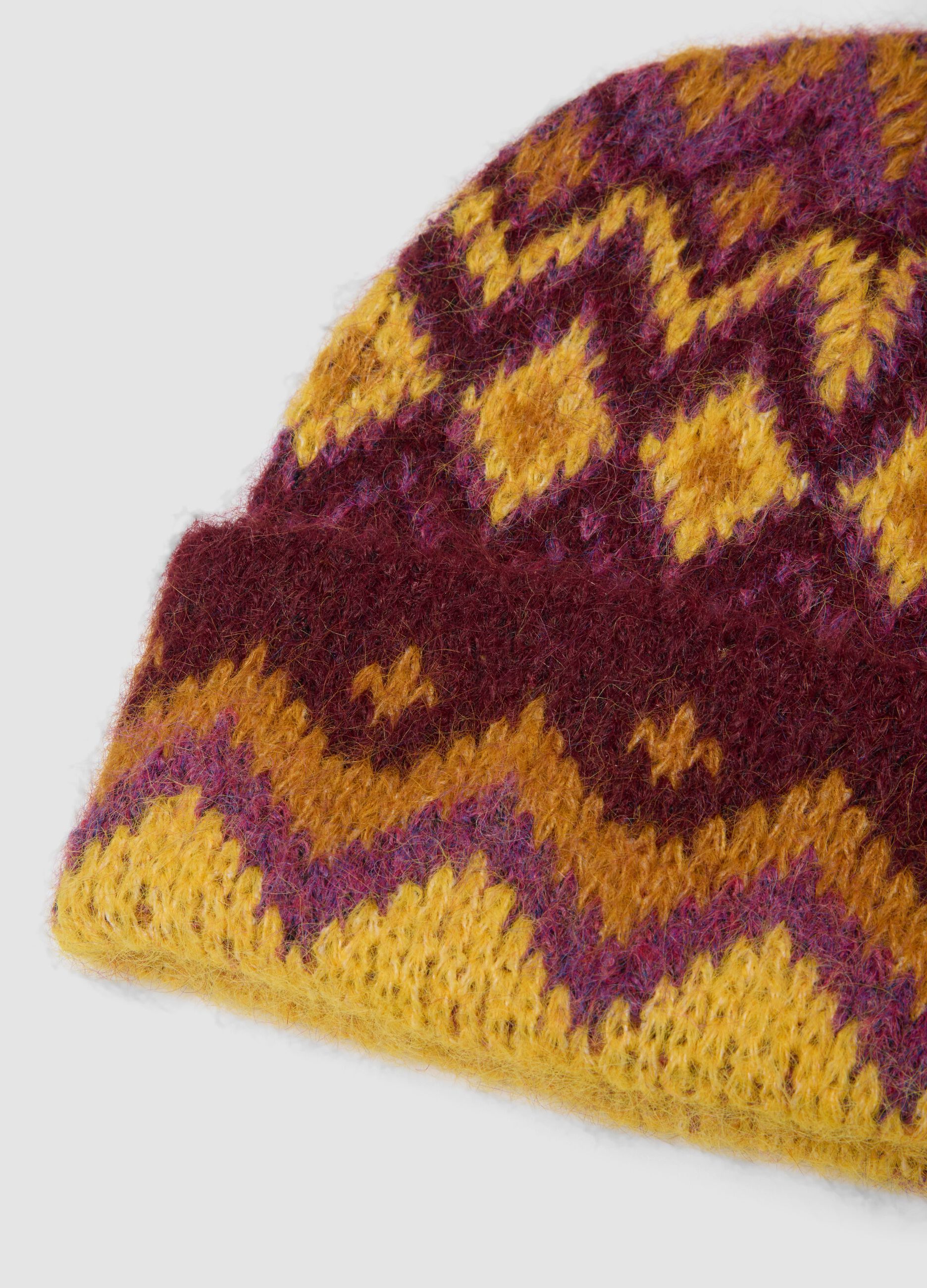 Cappello giallo e viola in lana elasticizzata jacquard