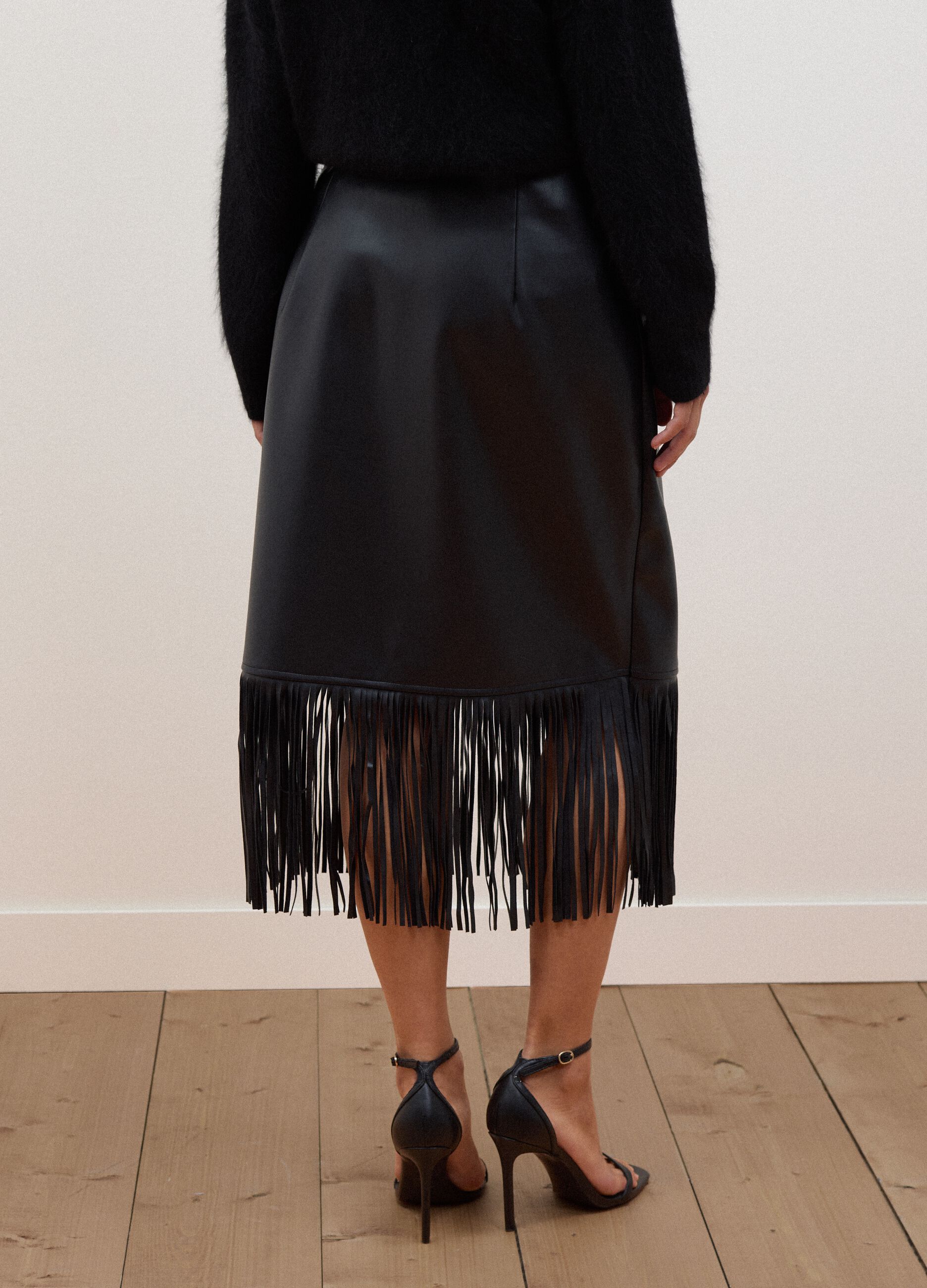 Black midi skirt with fringe hem