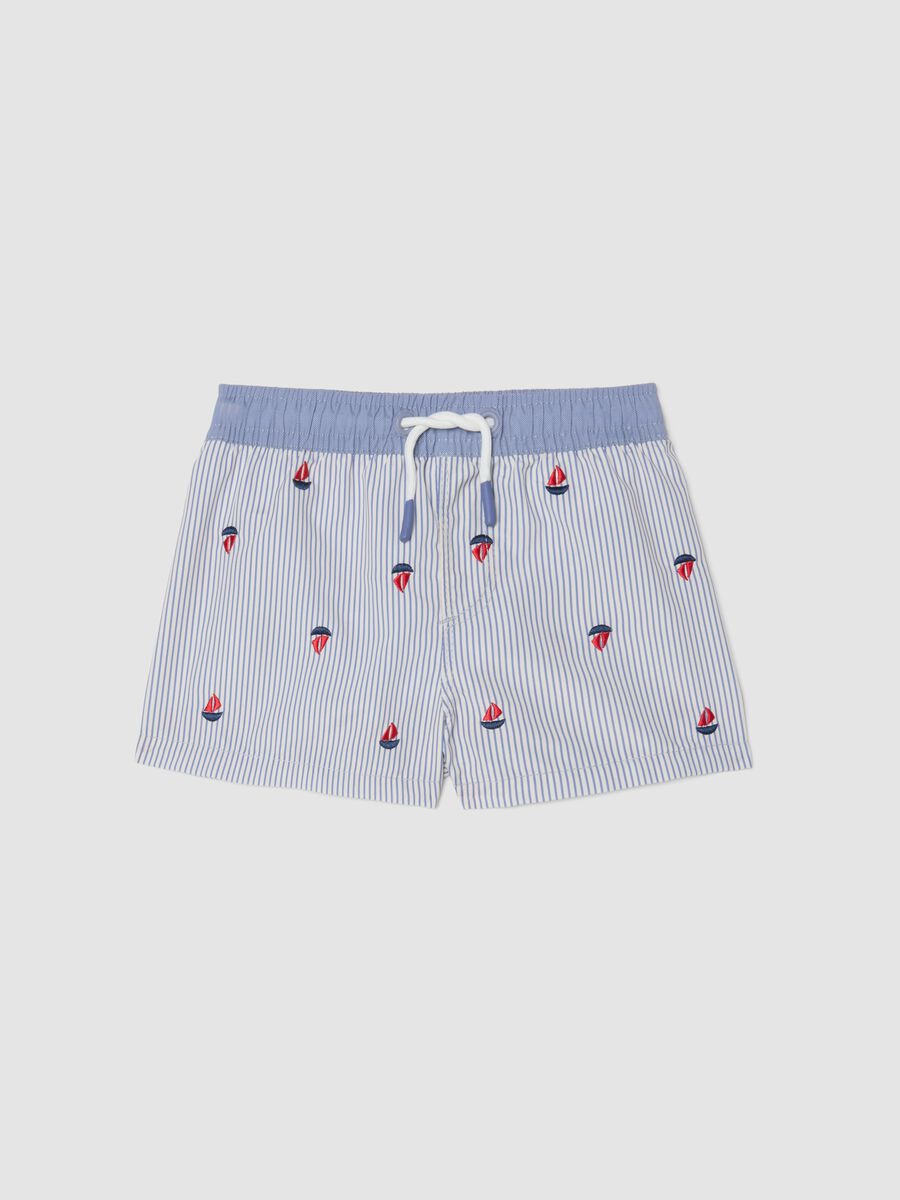 Blue striped baby swim shorts with embroidered boats_0