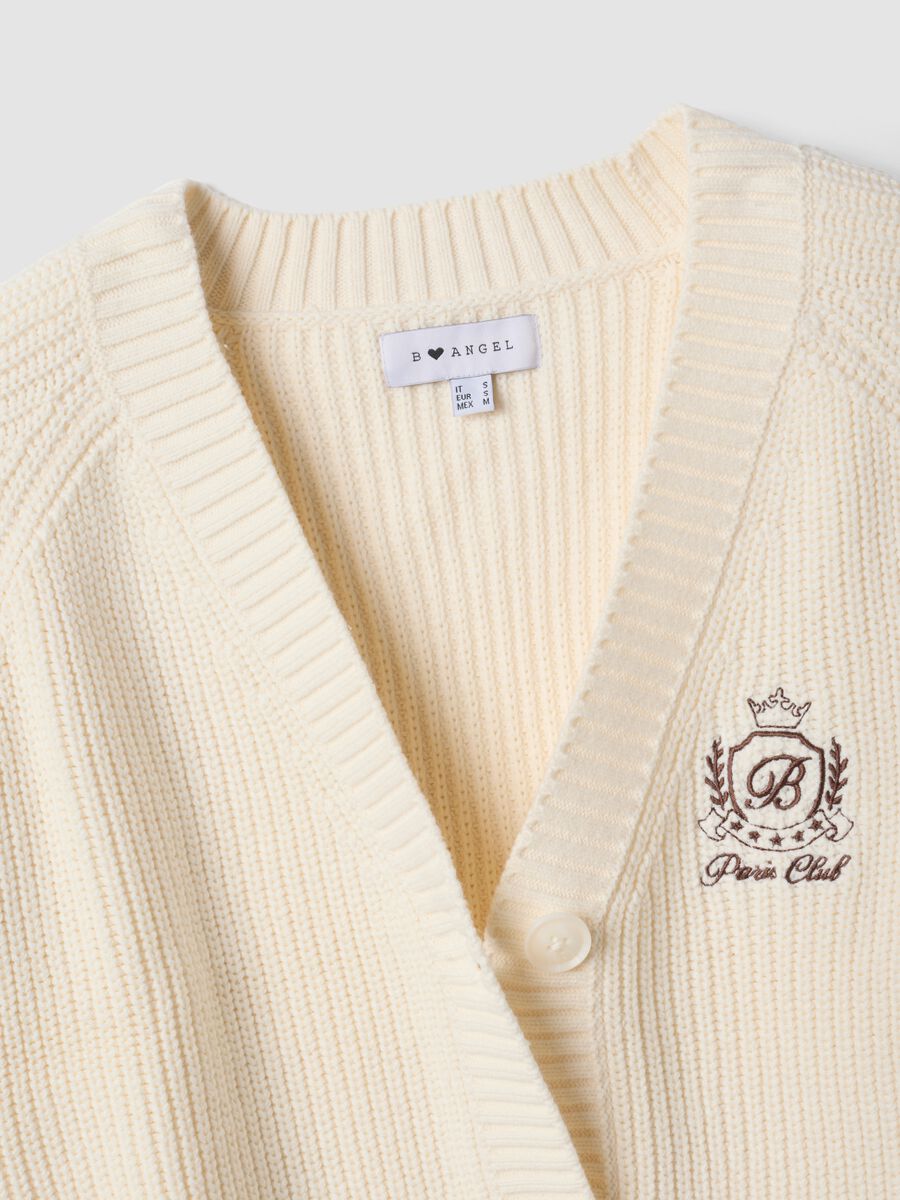 Beige cotton-blend fitted cardigan with deep V-neck_1