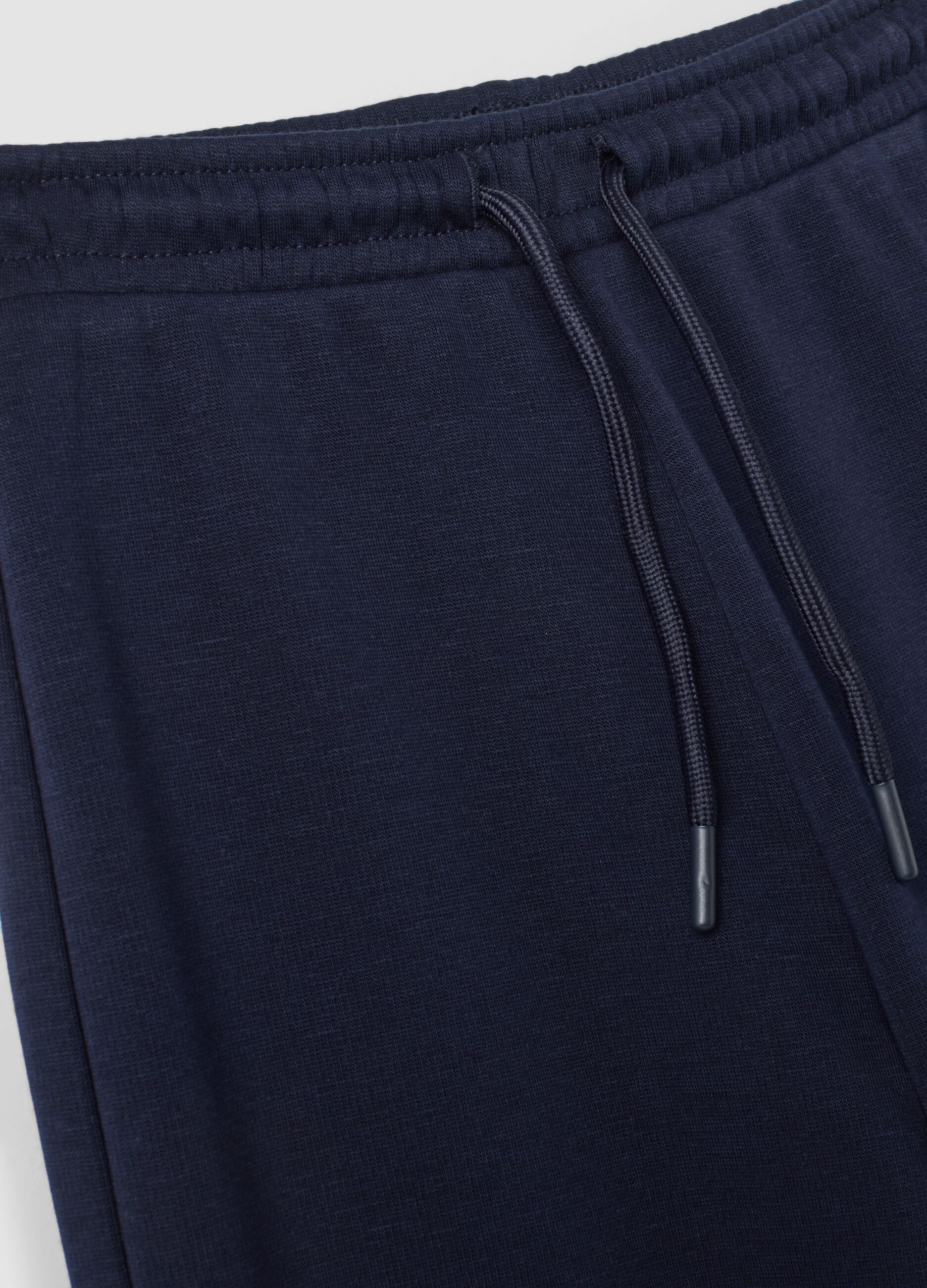 Pantaloni blu wide leg in tessuto fleece elasticizzato