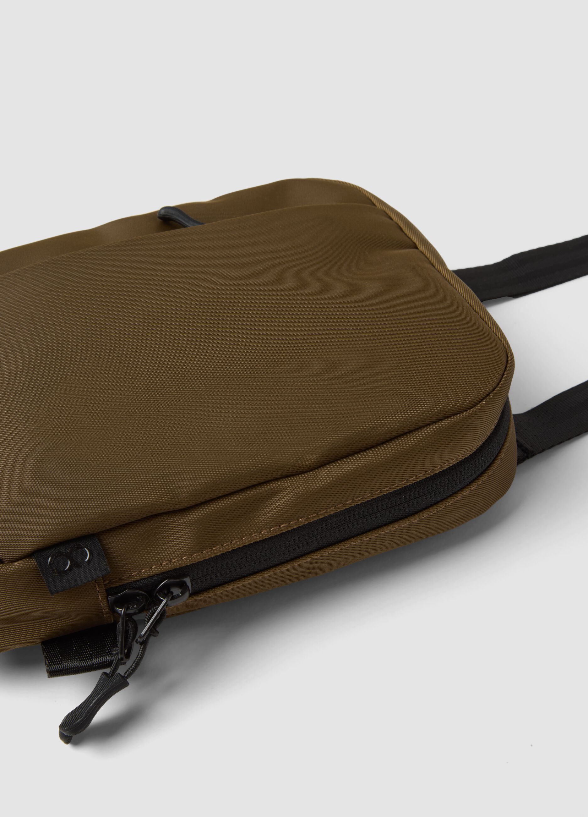 Brown water-repellent crossbody pouch with zip
