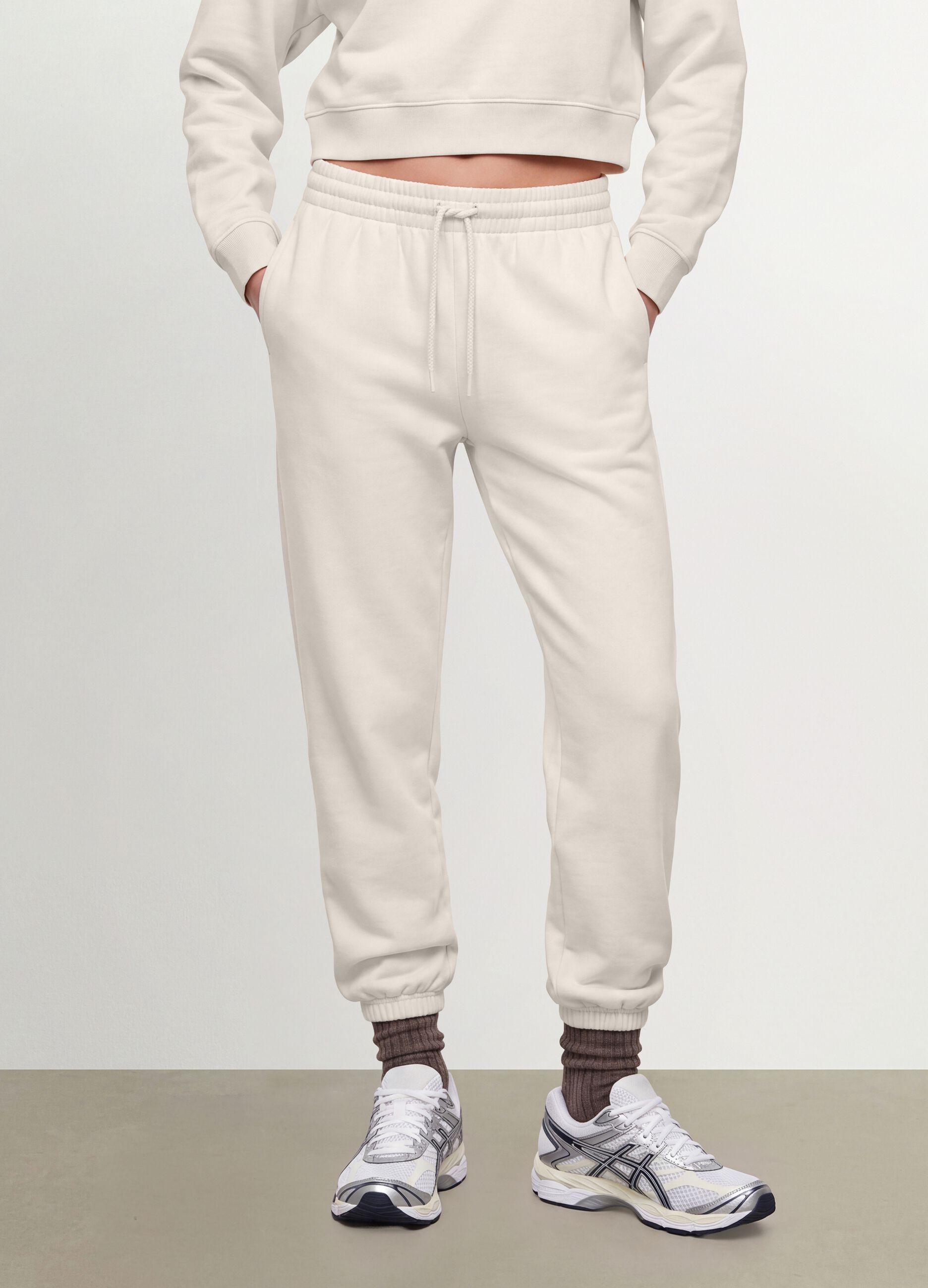 White cotton-blend joggers with elasticated waistband, regular fit