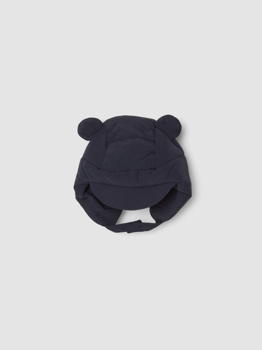 Padded midnight-blue hat with peak and ear flaps_1