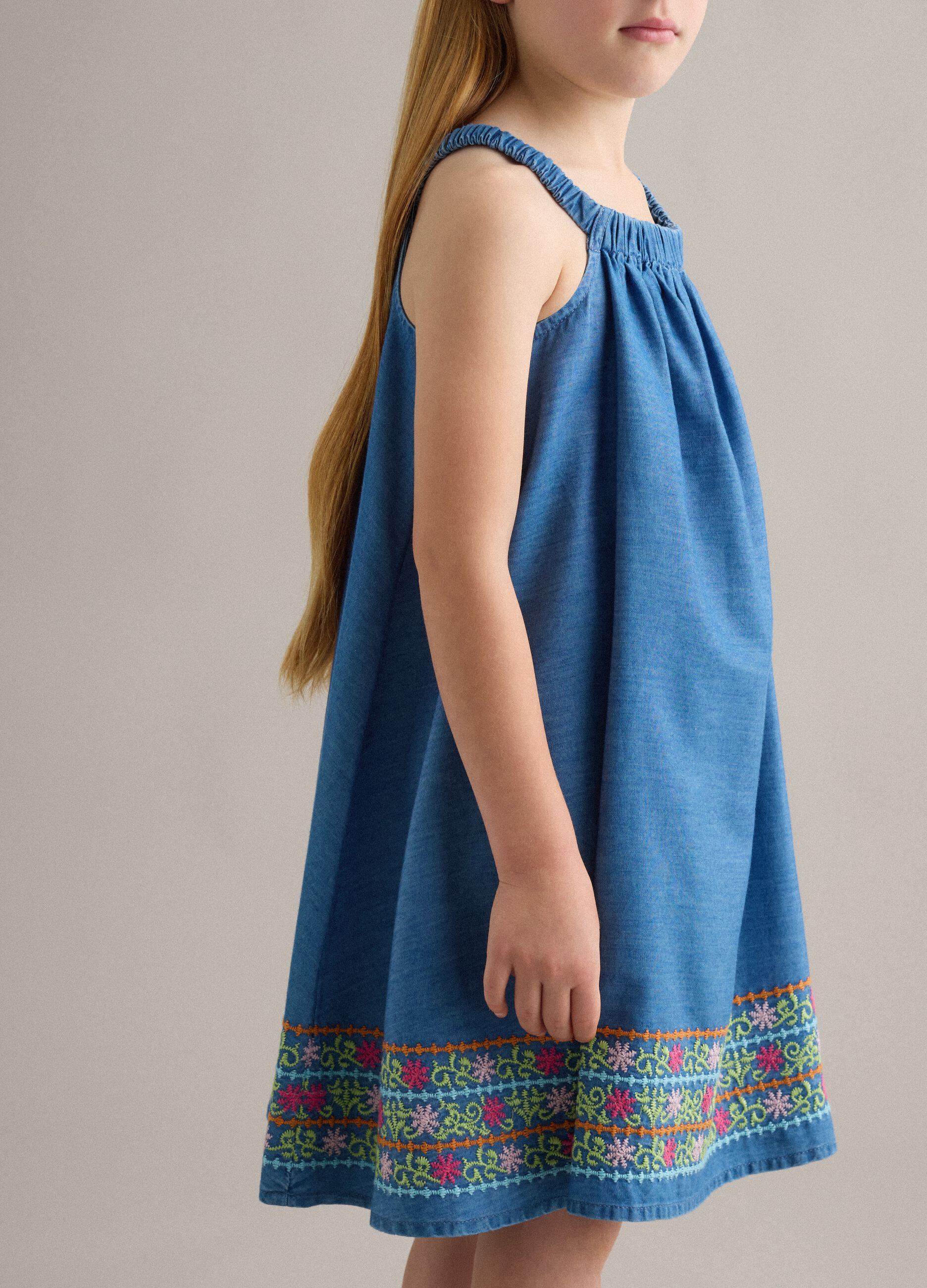 Blue pure lyocell dress with straps and hem embroidery