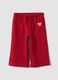 Red pure cotton trousers with elasticated waist and print for baby girls_0