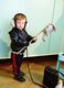 Black padded hooded zip-up bomber jacket for boys_0
