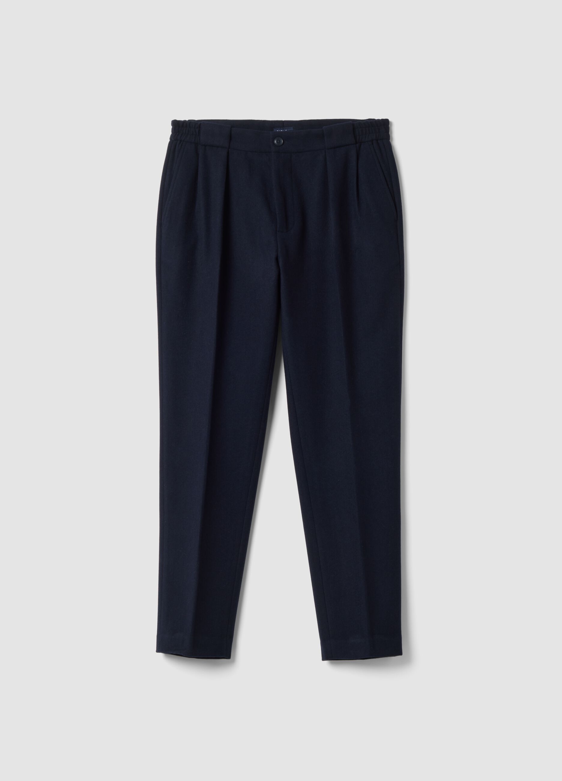 Navy blue formal carrot-fit trousers in wool and viscose blend