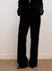 Pantaloni neri flare in tessuto elasticizzato_1