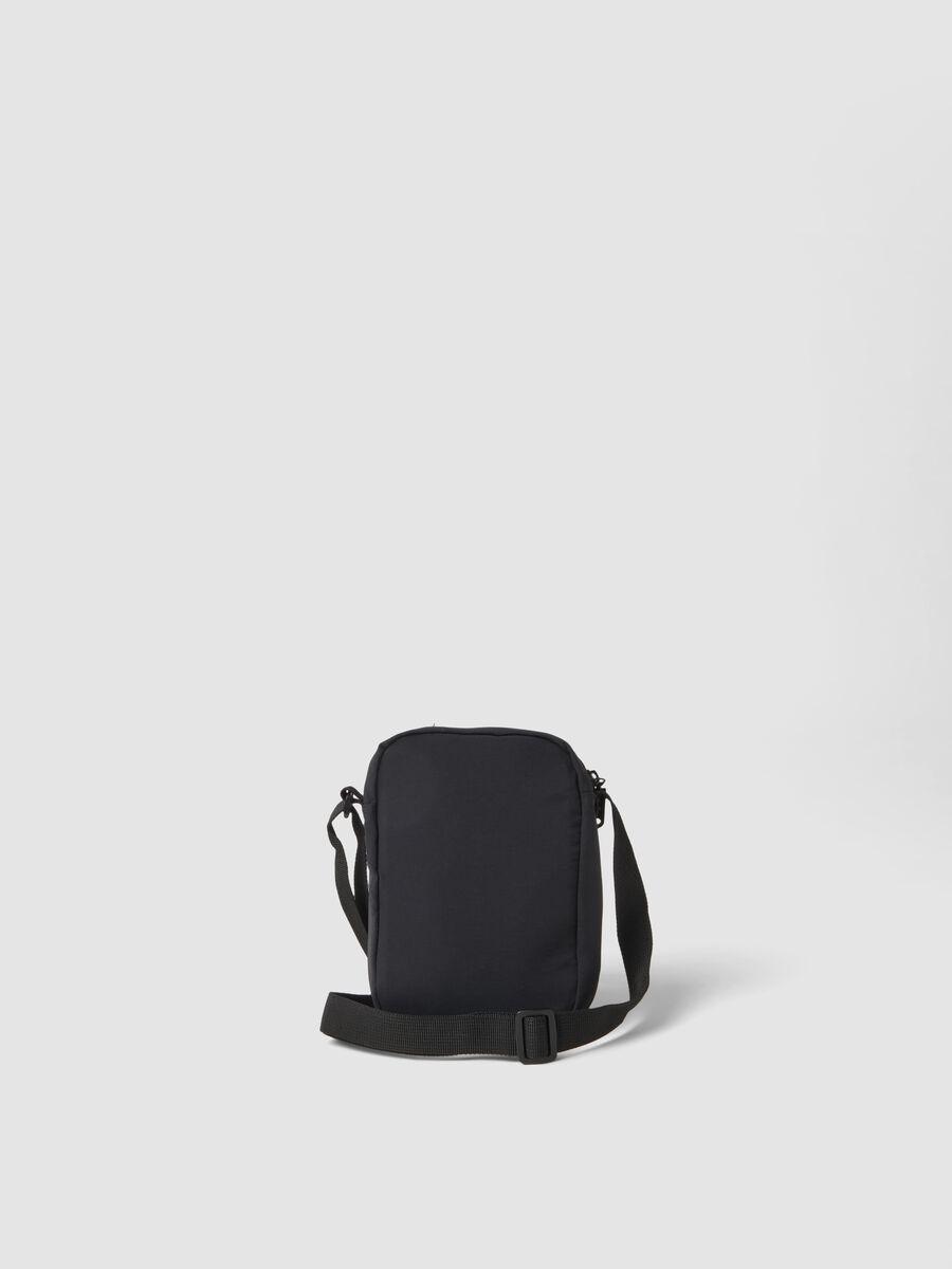 Black crossbody bag with zip closure and adjustable strap_1