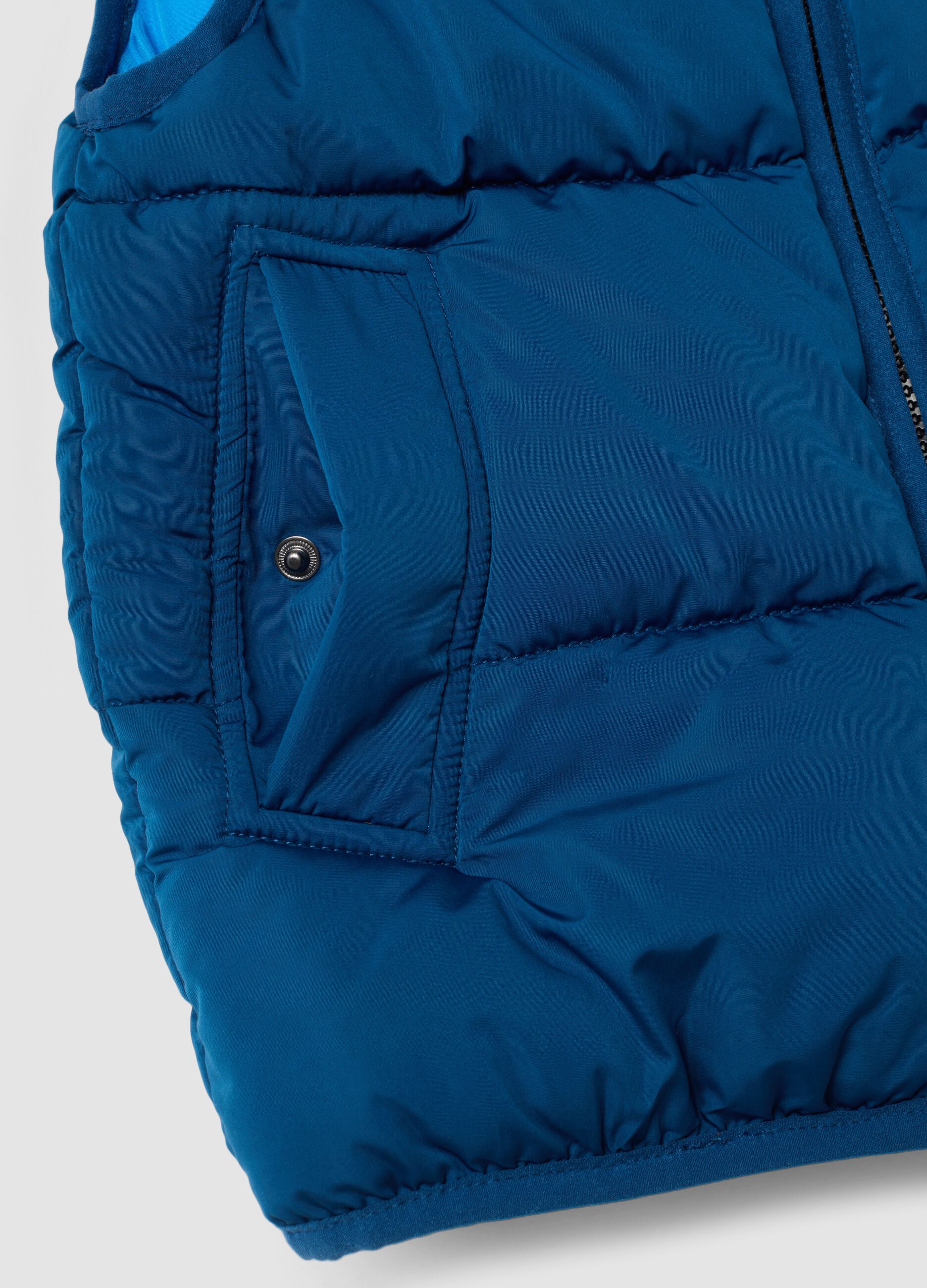Blue padded gilet with zip and high neck, regular fit