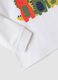 T-shirt bianca in cotone organico elasticizzato con dinosauri over fit_2