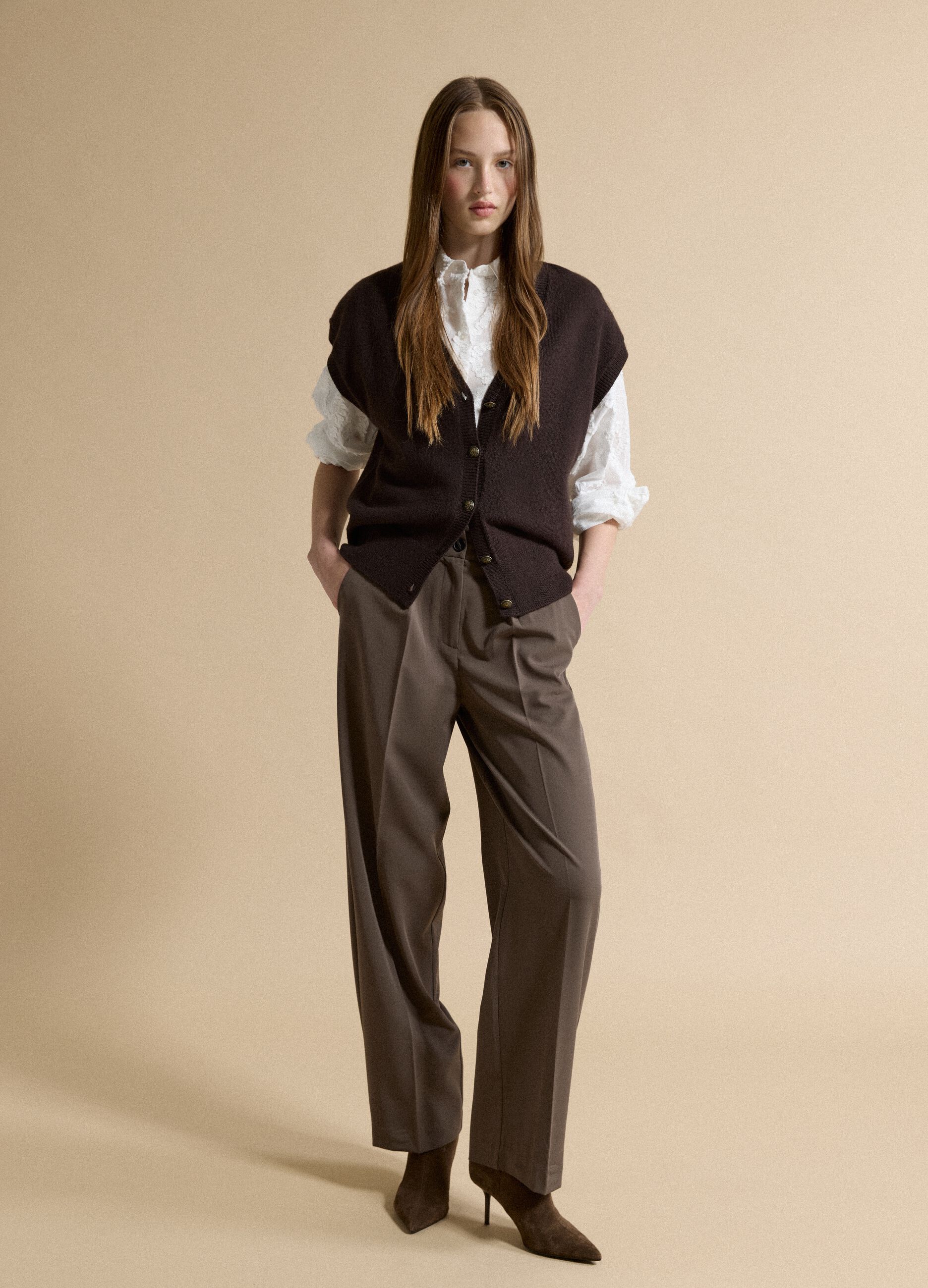 Brown V-neck button-up vest with oversized fit