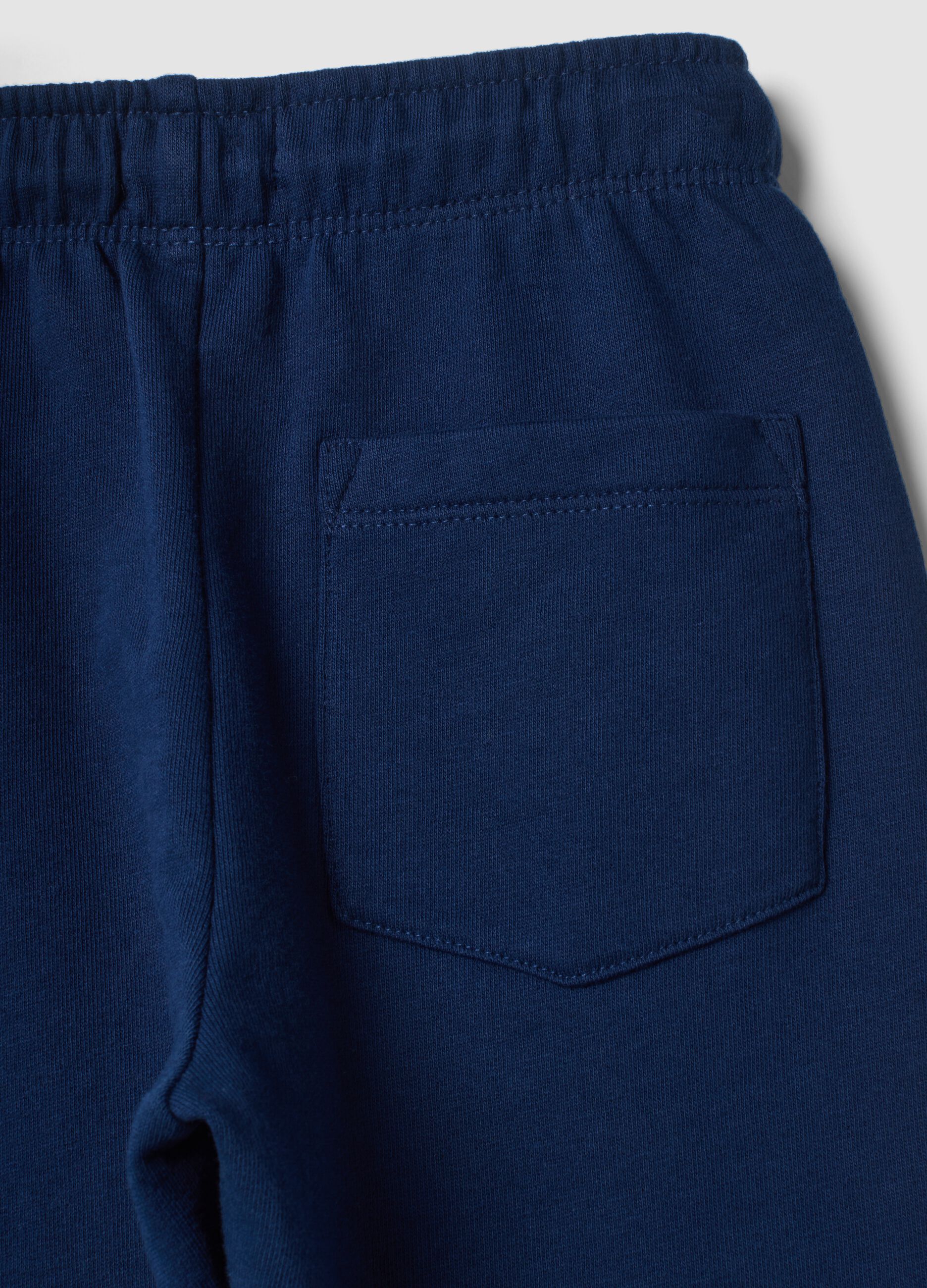 Pantaloni jogger blu in puro cotone con stampa