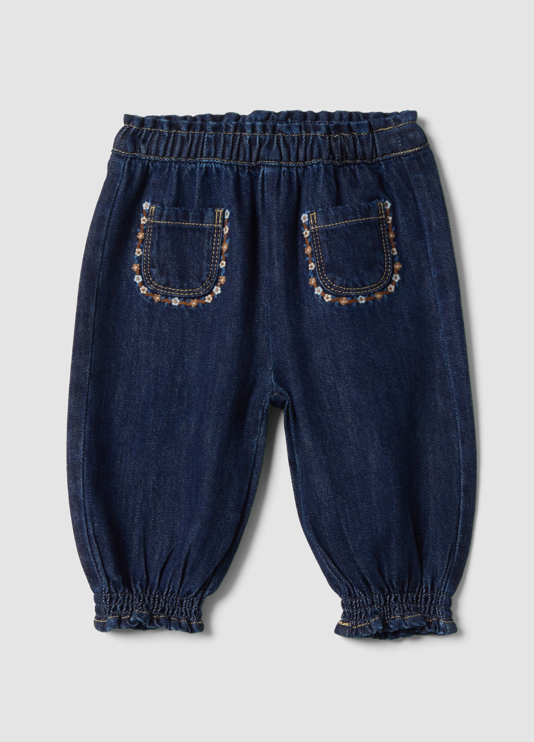 Blue denim joggers in cotton-viscose blend with floral embroidery, comfort fit