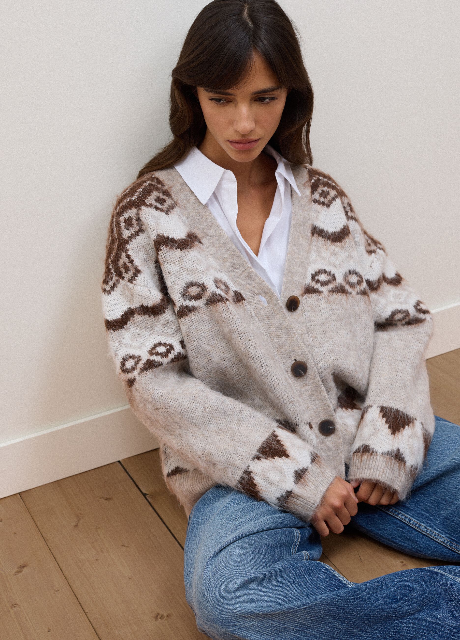 Beige wool and alpaca-blend cardigan with deep V-neck, oversized fit
