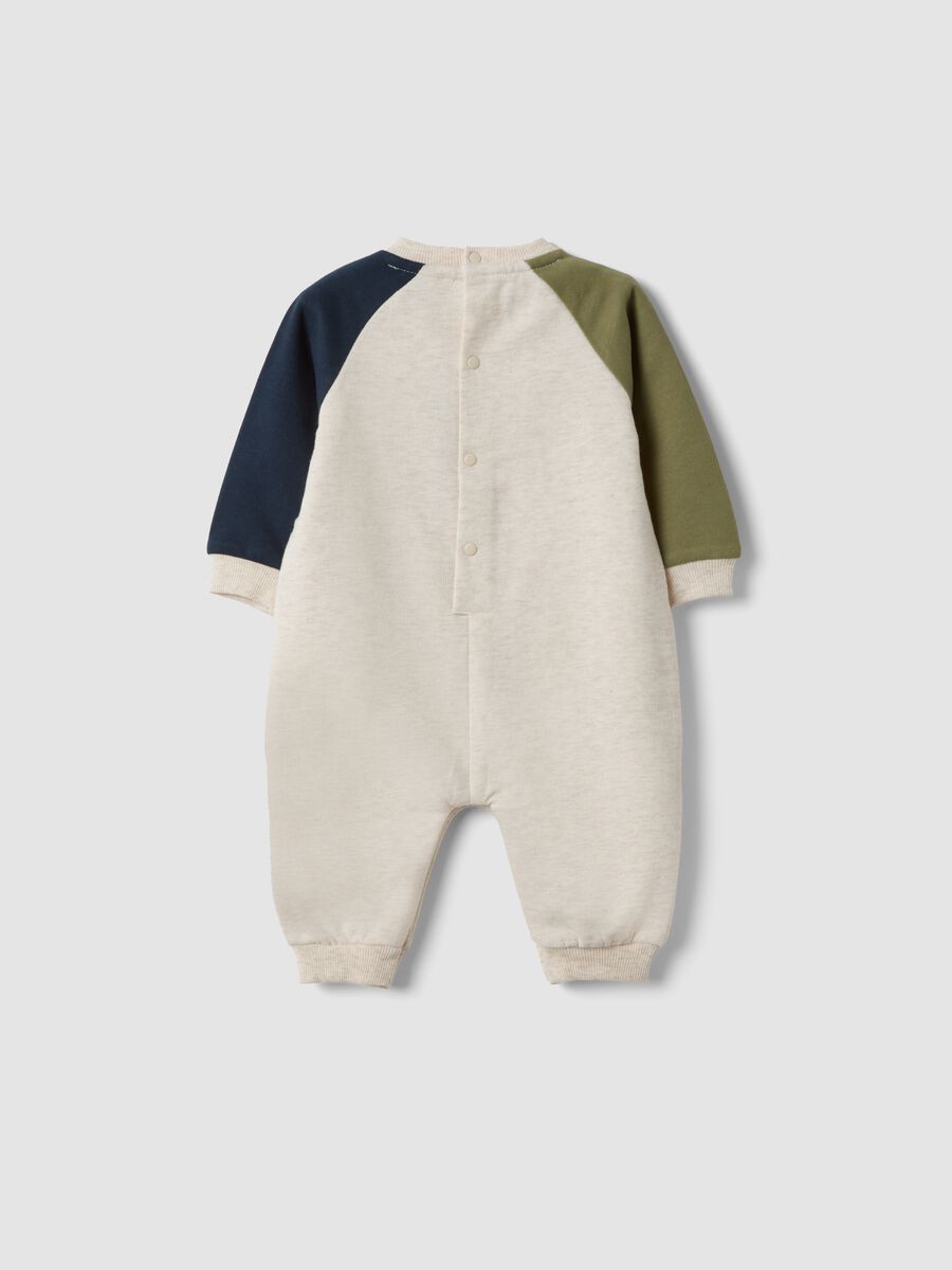 Beige organic cotton dinosaur print baby sleepsuit_1