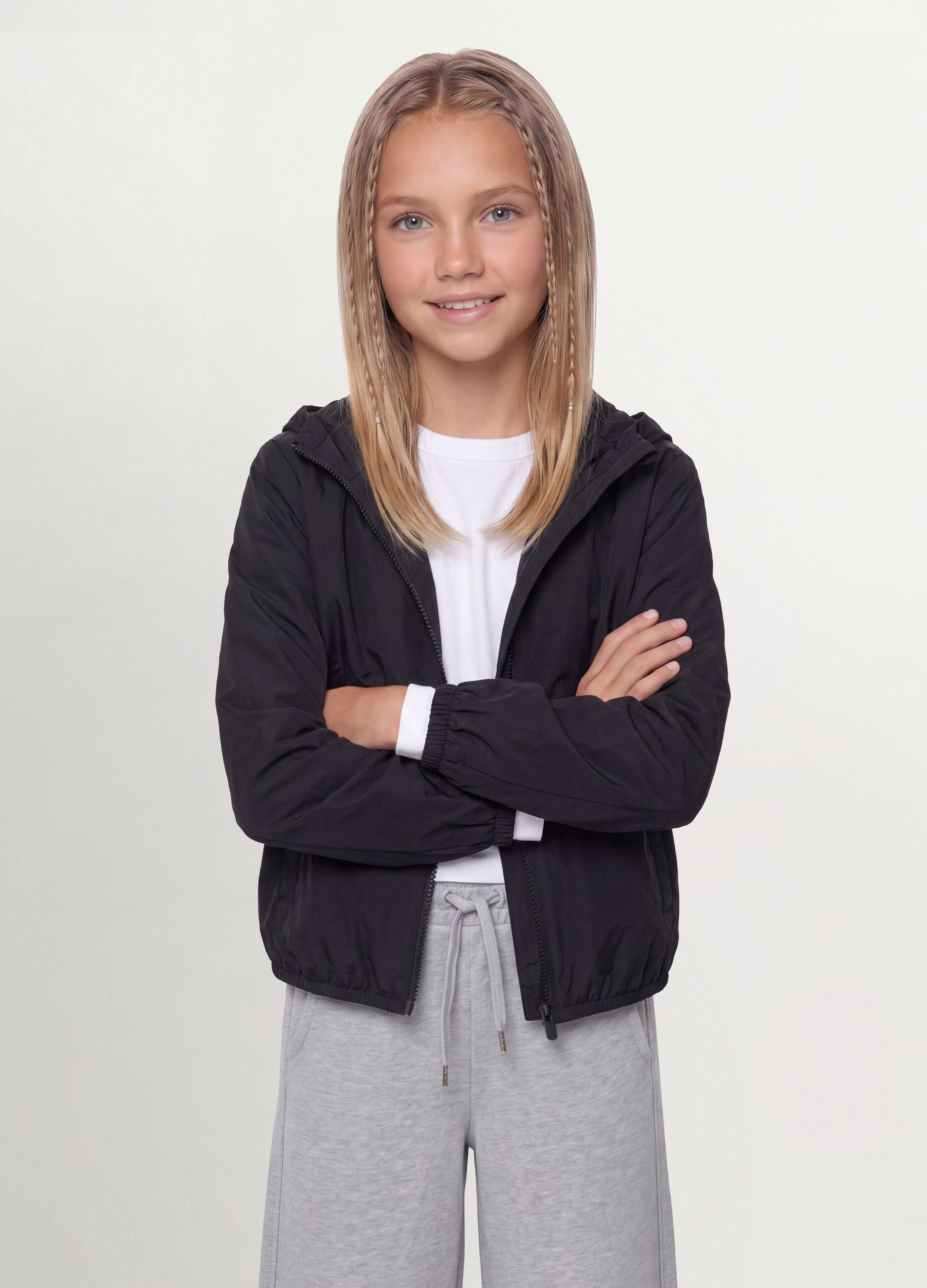 Black rain jacket with hood and zip for girls