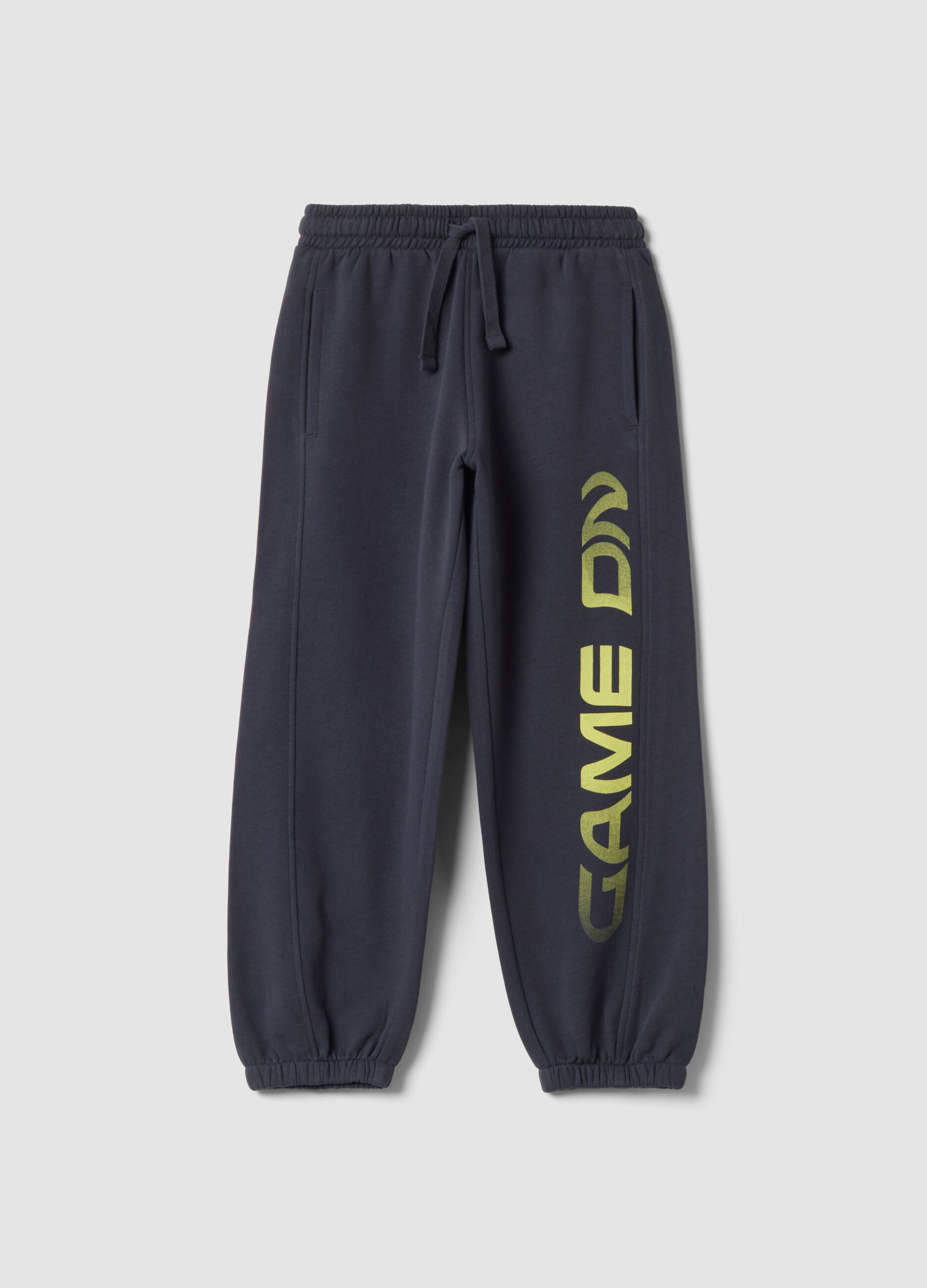 Pantaloni jogger grigi in puro cotone organico con stampa