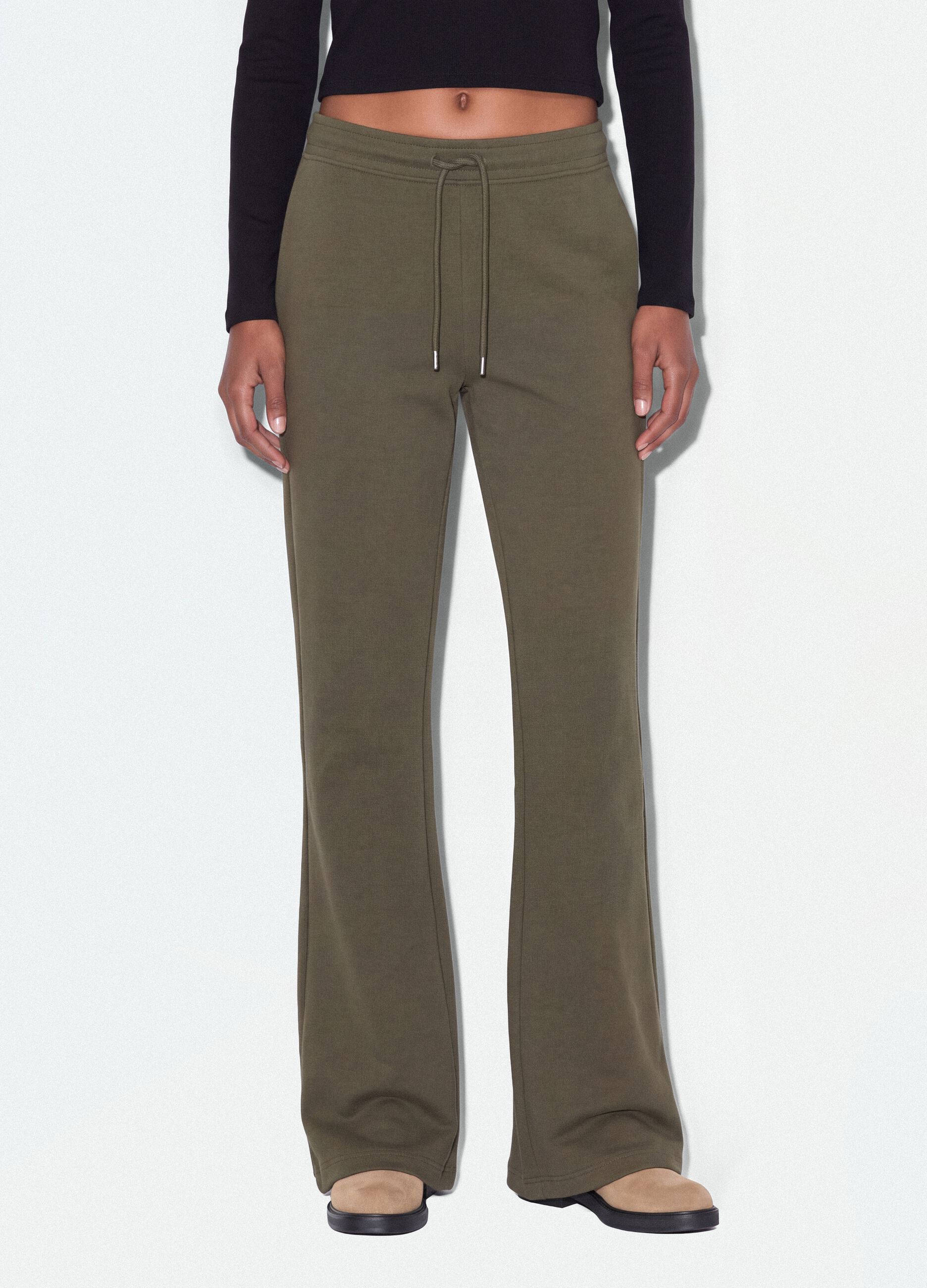 Jogger verde flare in cotone organico elasticizzato