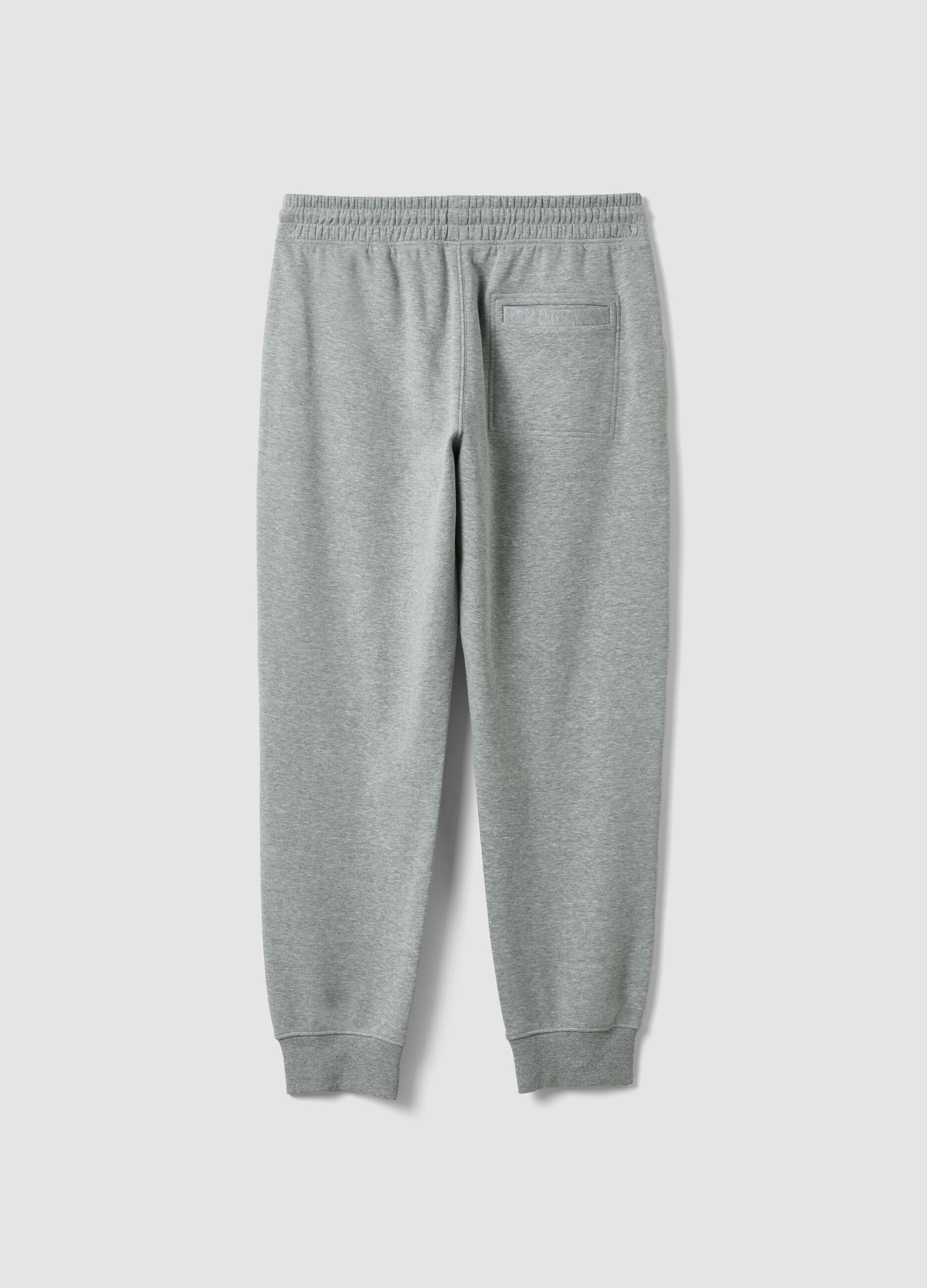 Grey cotton-blend joggers with cuffed hems and drawstring