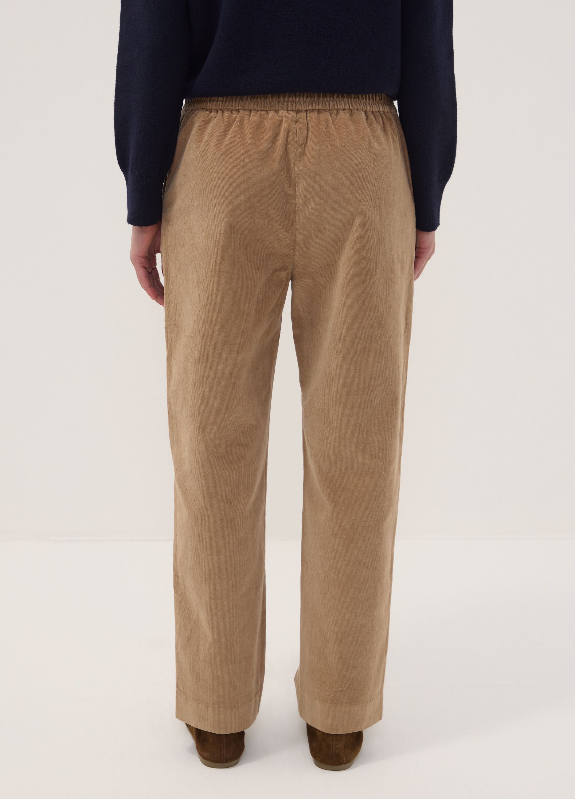 Beige ribbed stretch cotton trousers with elasticated waistband
