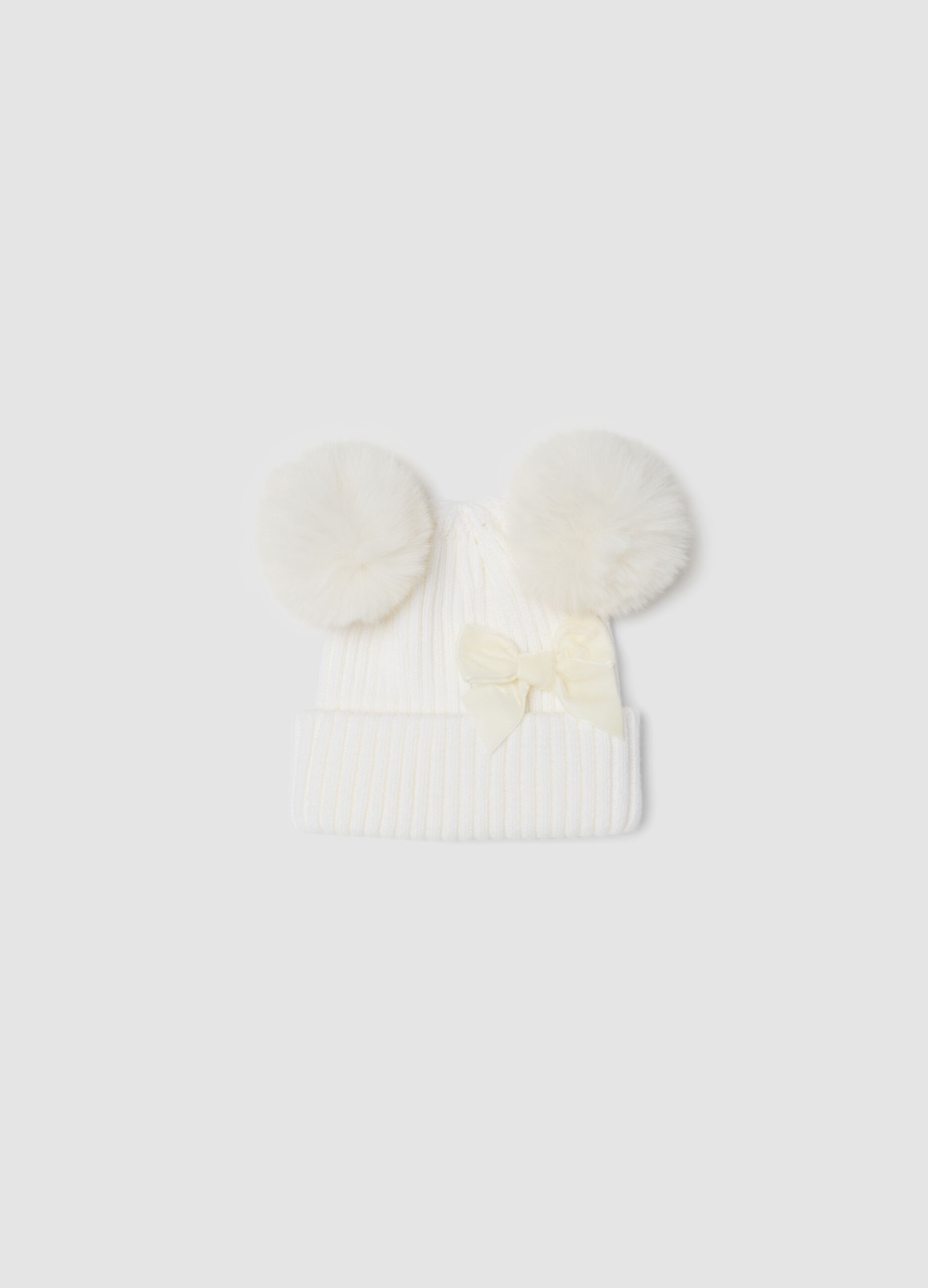 White rib-knit hat with bow and pom-poms