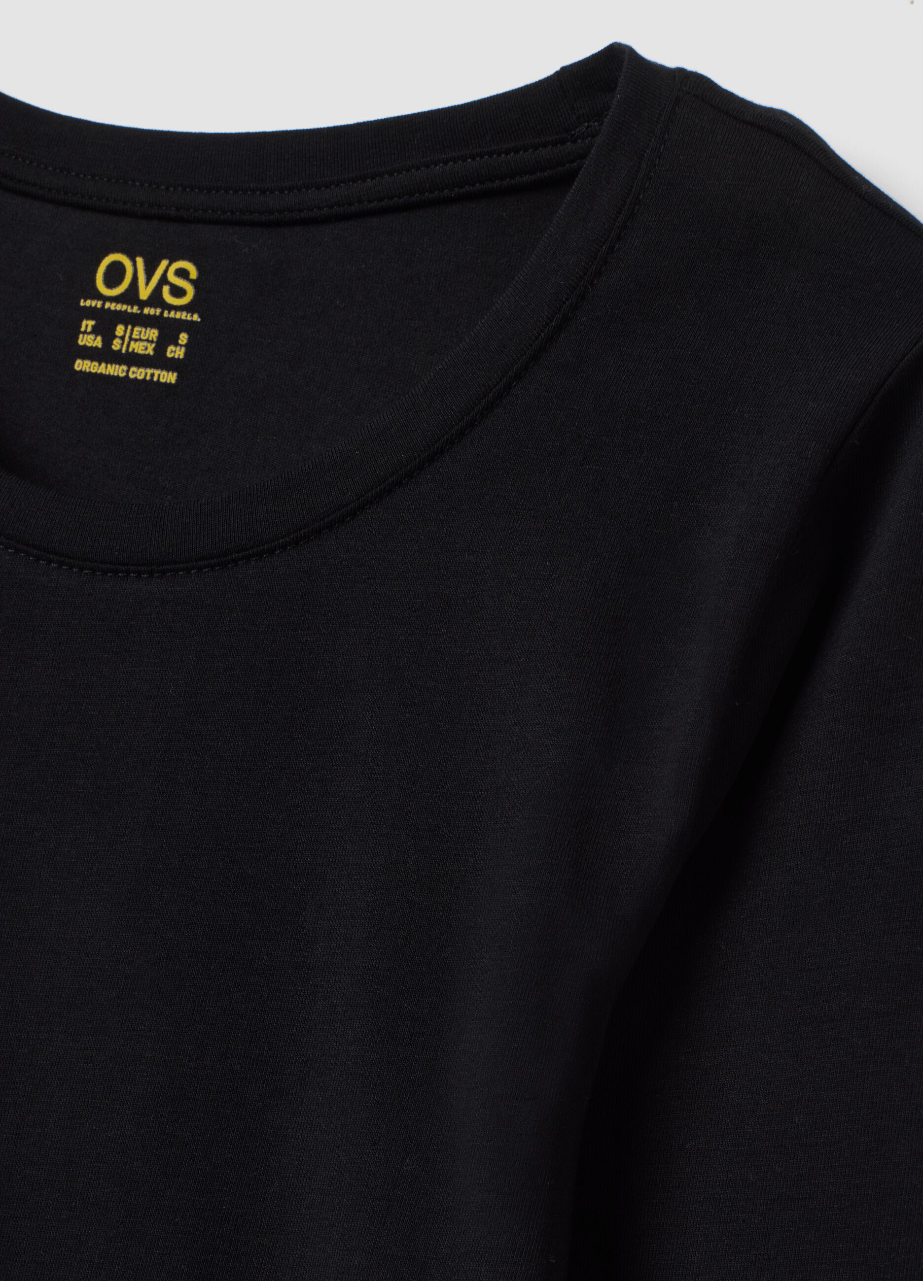 Maglia nera in cotone organico elasticizzato girocollo