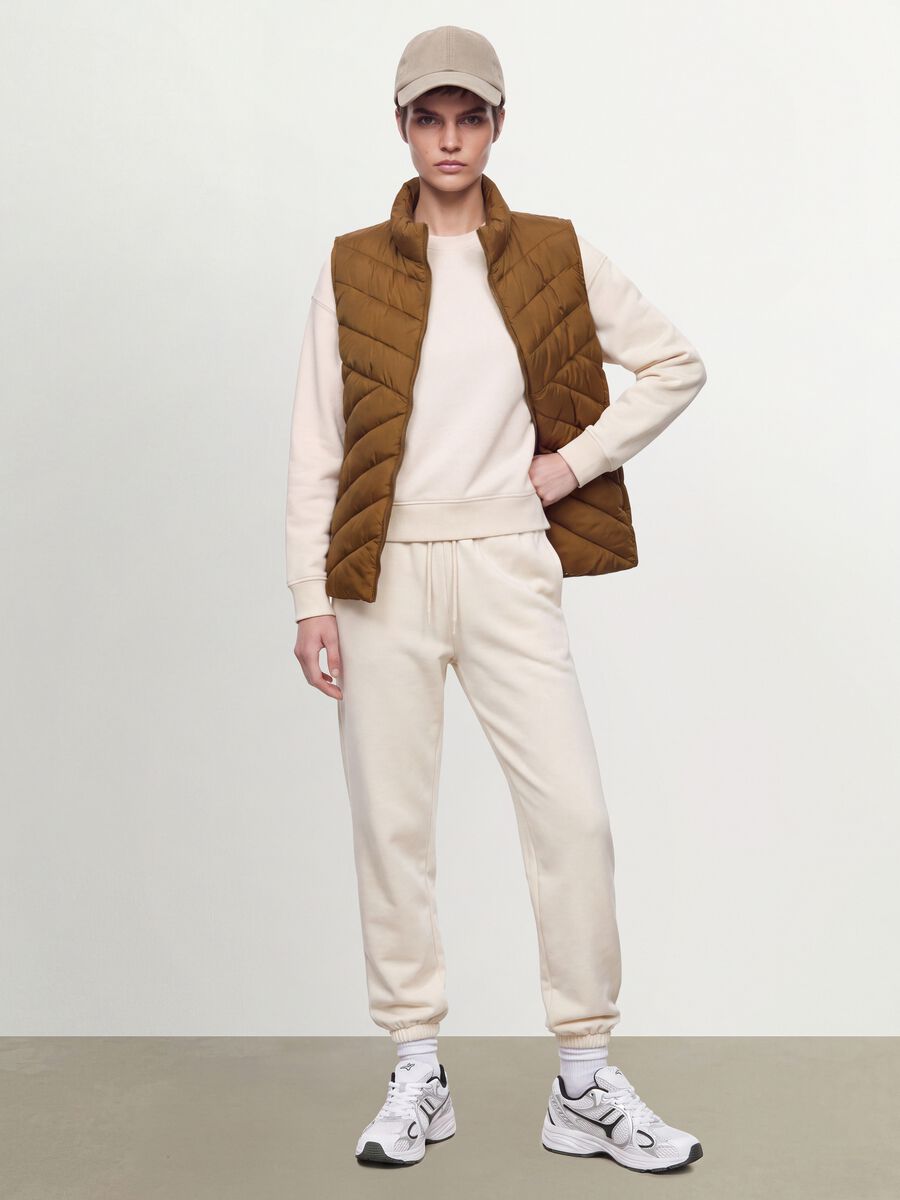 Yellow ultralight quilted gilet with zip and high neck_1