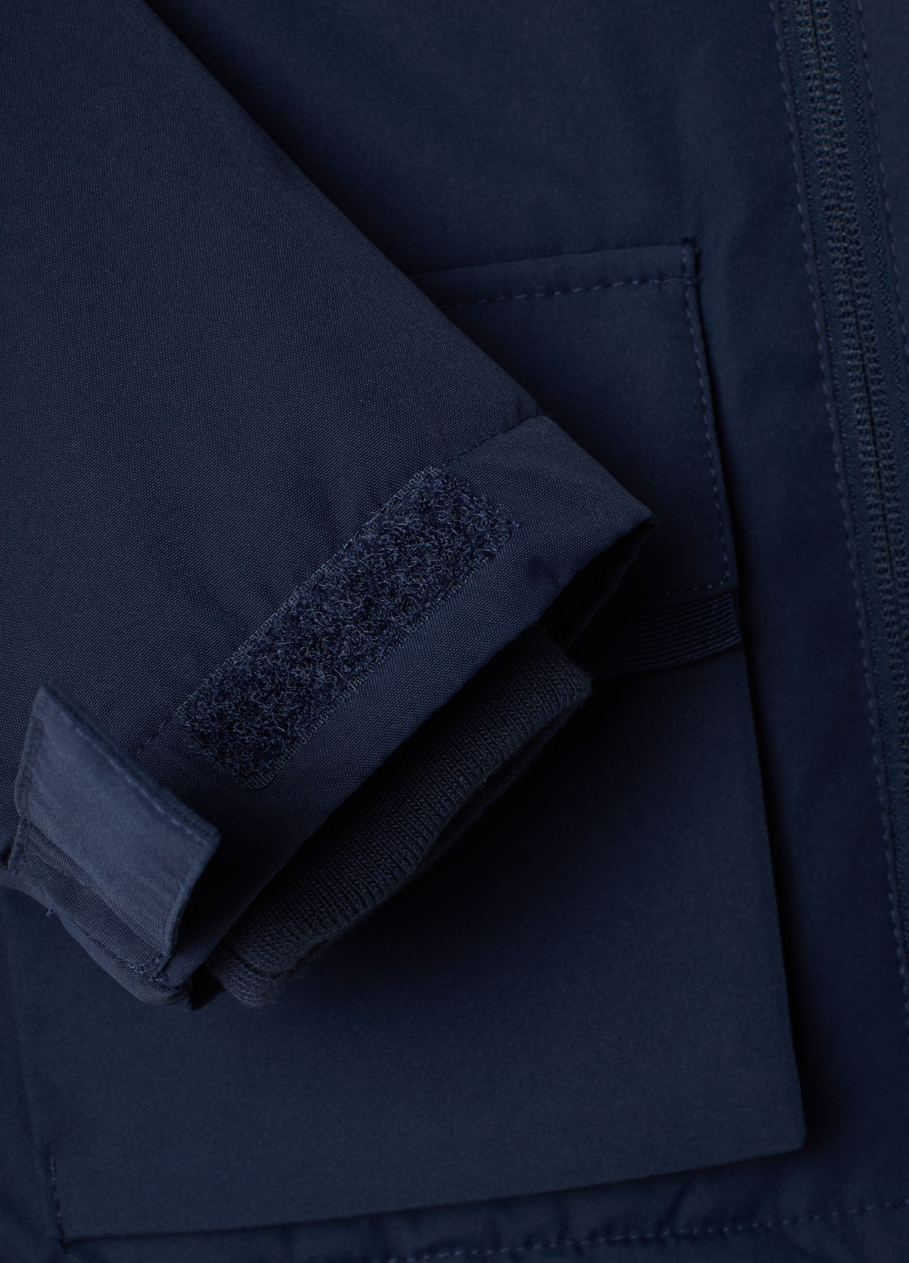 Giacca blu imbottita con cappuccio e zip per bimbo